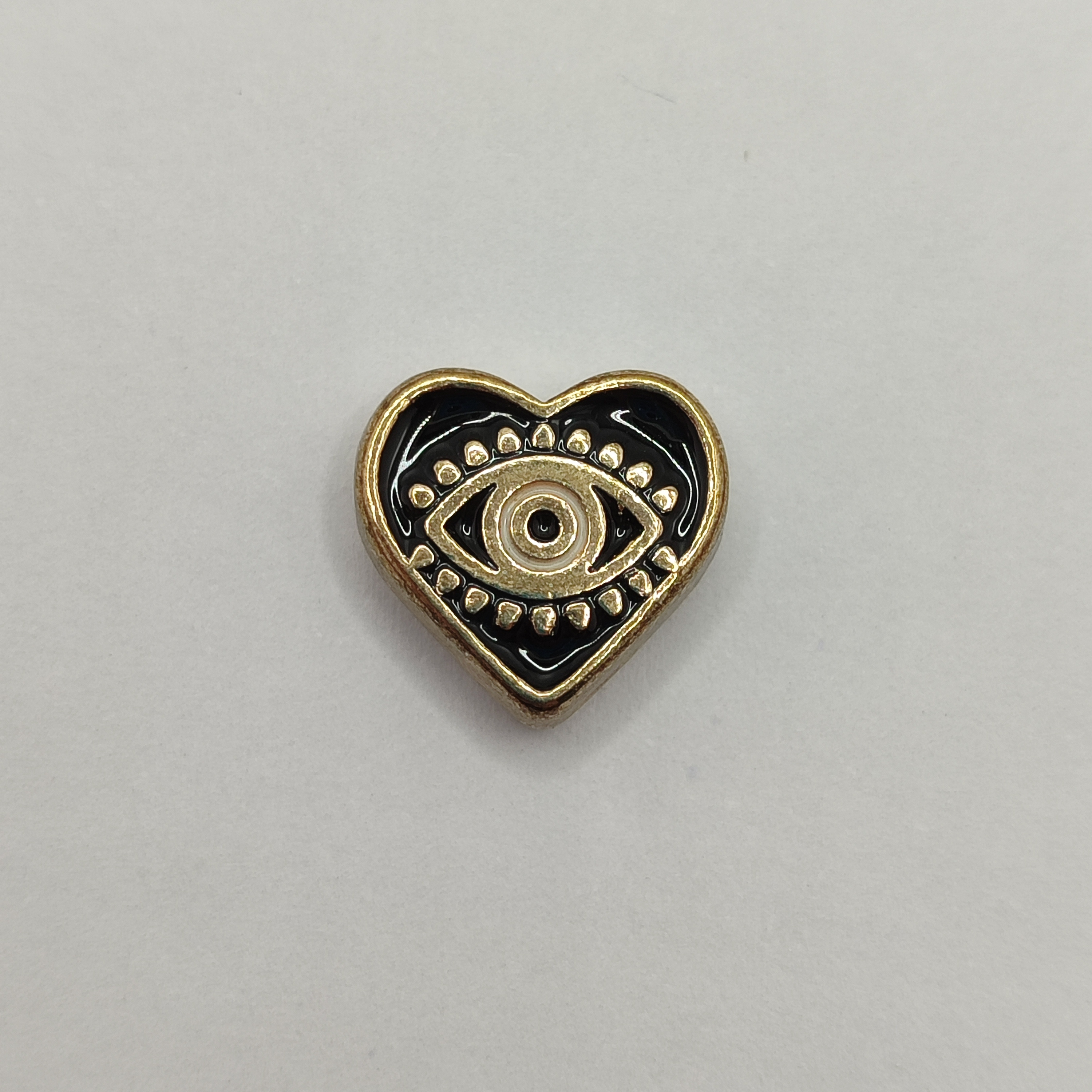 PASADOR ESMALTADO CORAZON CON OJO TUR