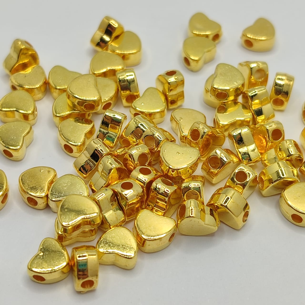 BOLSA 60 UND CORAZONES DORADOS PEQ