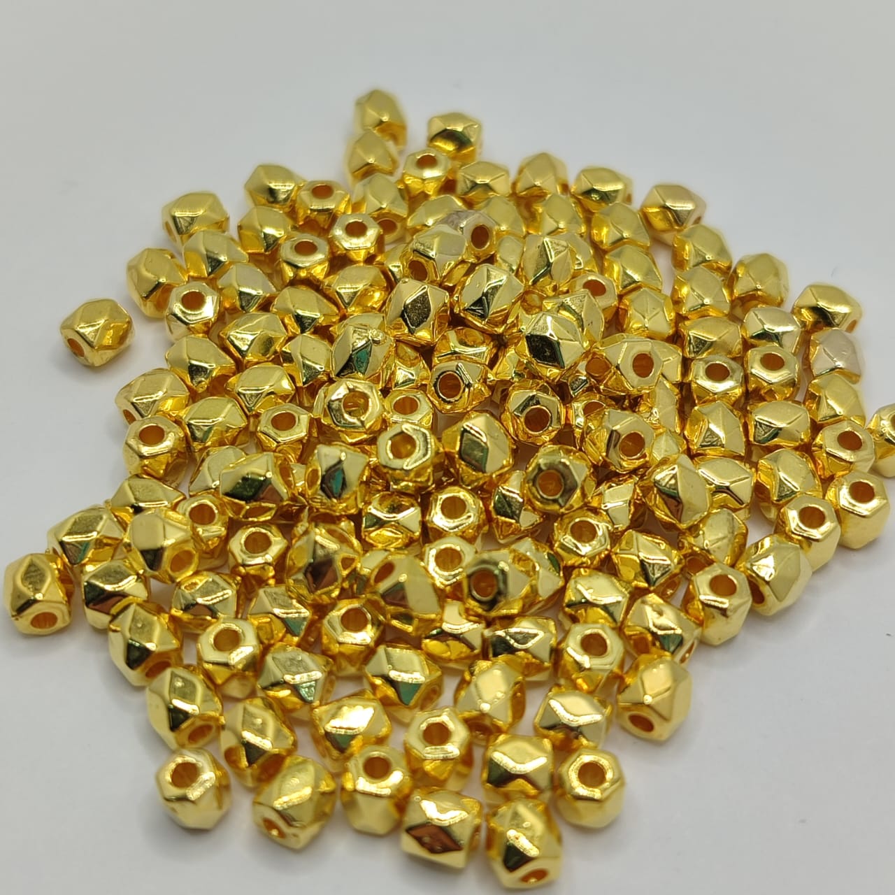 BOLSA 140 UND ROMBO DORADO