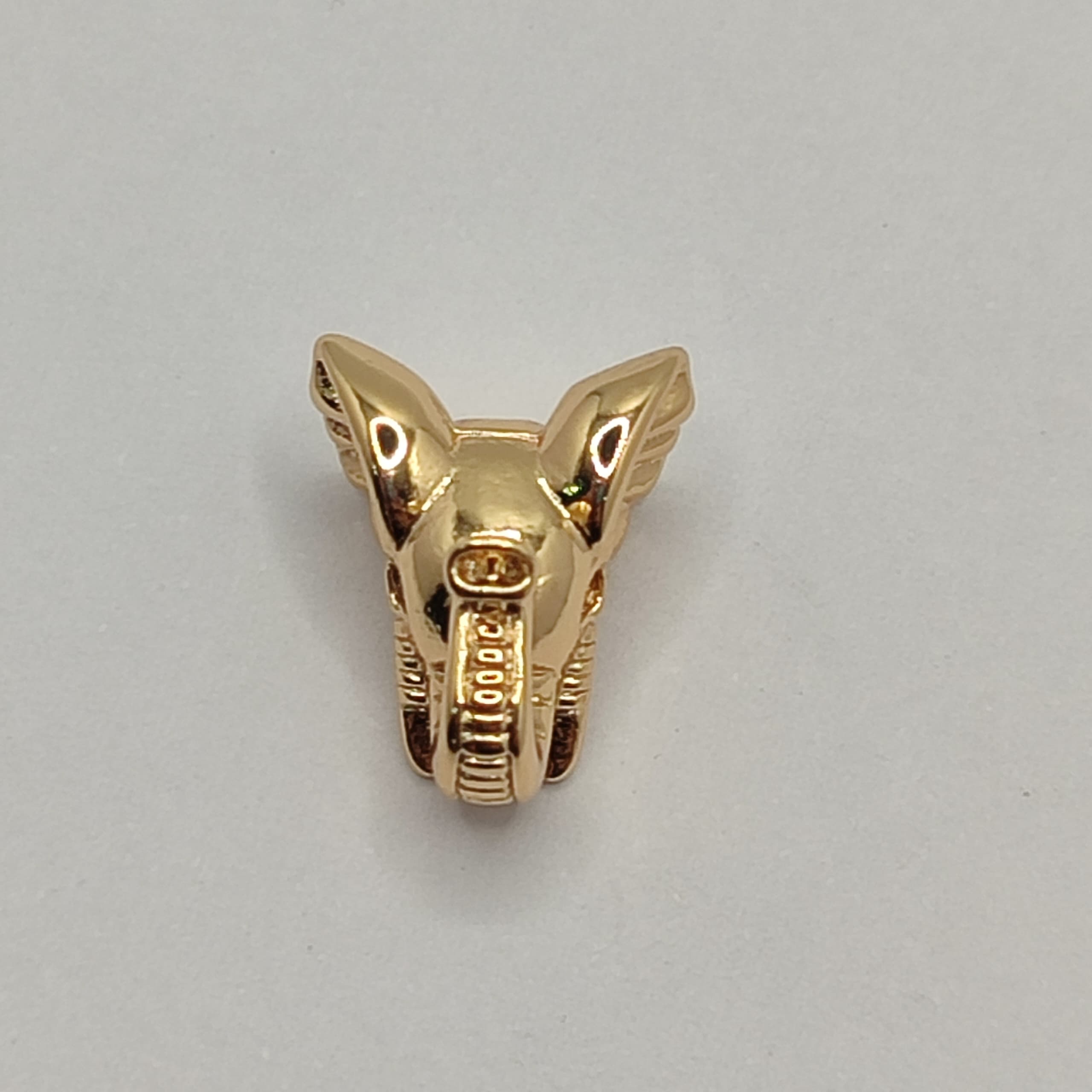 PASADOR ELEFANTE DORADO