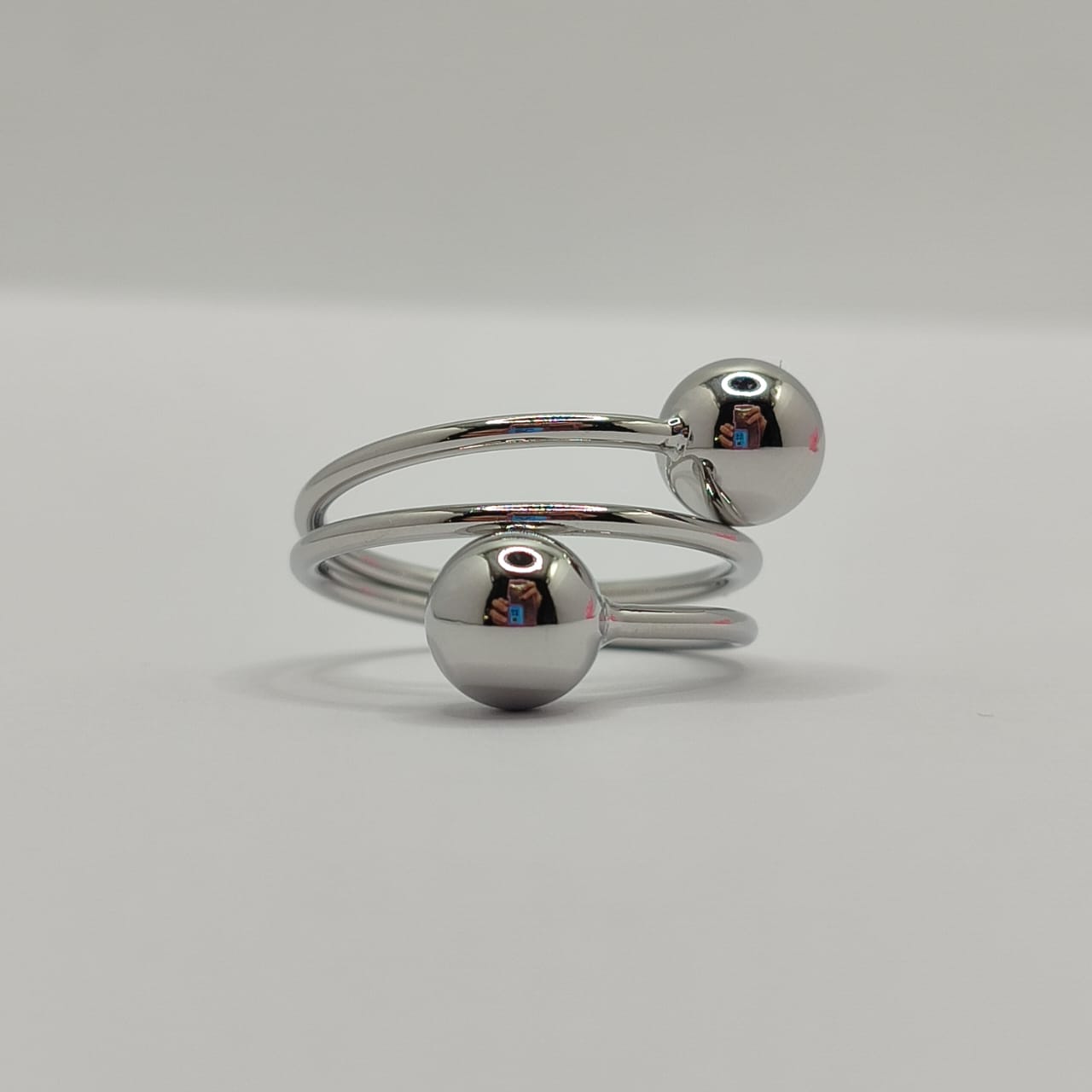 ANILLO AJUSTABLE PLATEADO ESPIRAL DOS ESFERAS