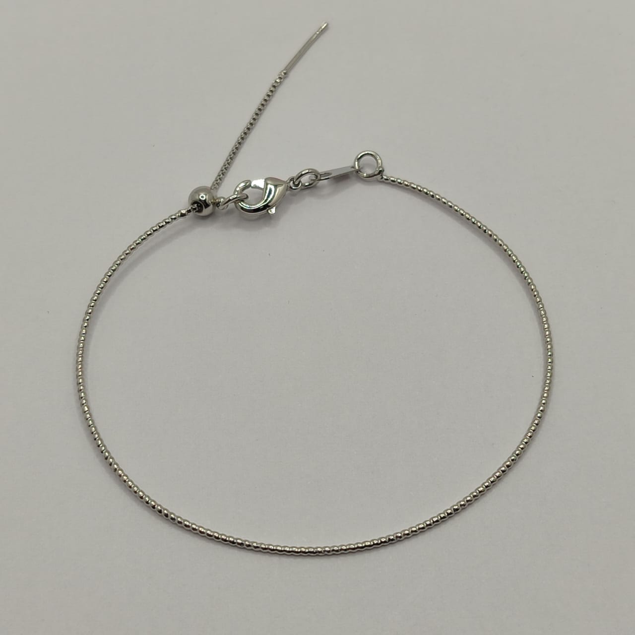 PULSERA DE AGUJA PLATEADA