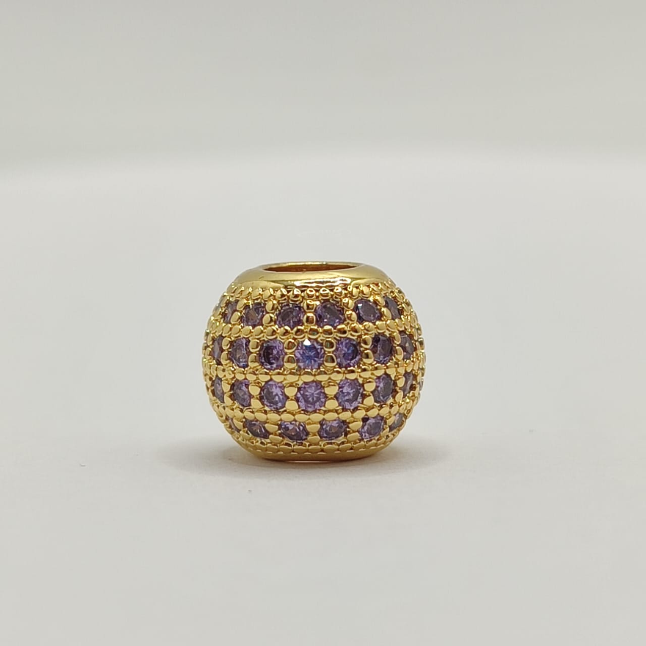 CIRCON BOLA DE FUEGO DORADO CON CRISTAL MORADO