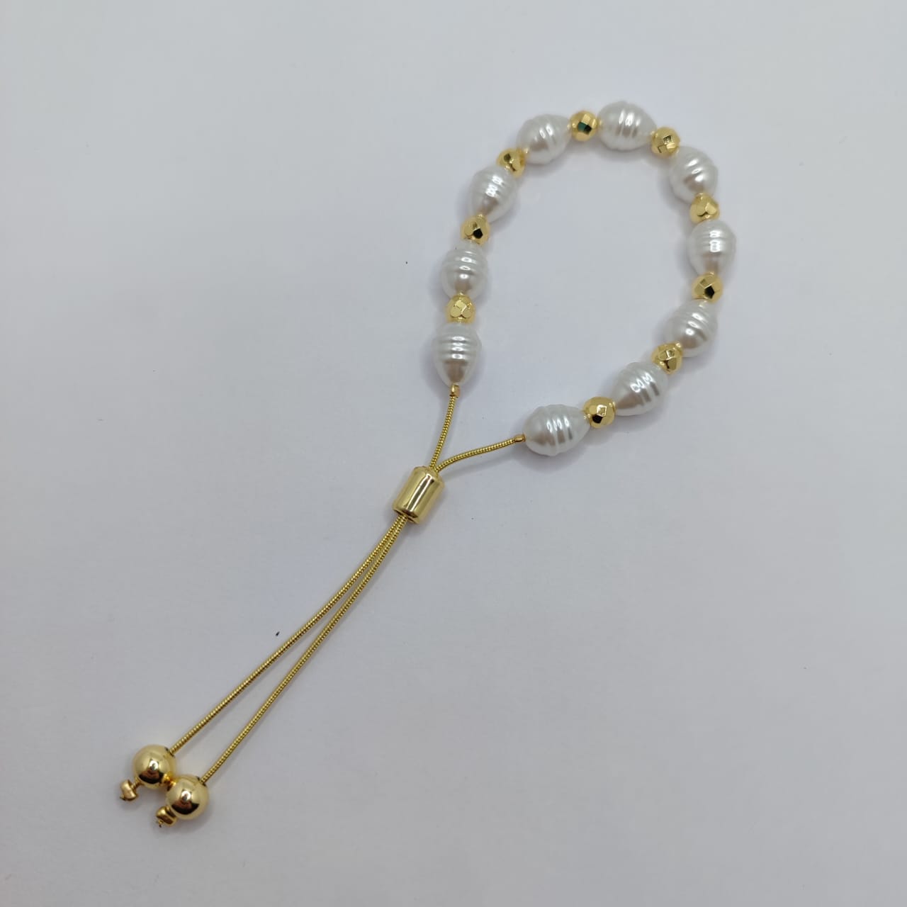 PULSERA DE PERLA IRREGULAR 8MM CON BALIN FACETADO