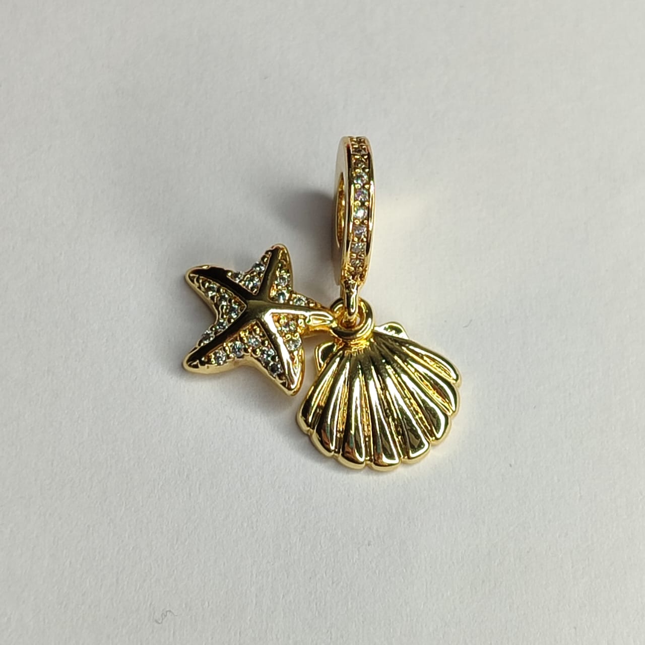 PANDORA DIJE ESTRELLA DE MAR Y OSTRA