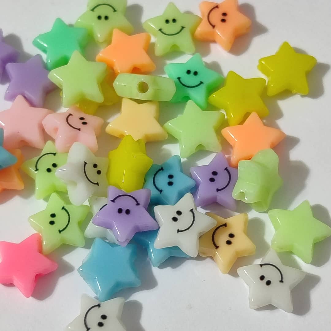 PAQUETE ESTRELLAS DE COLORES CON CARITA FELIZ (8 UND)