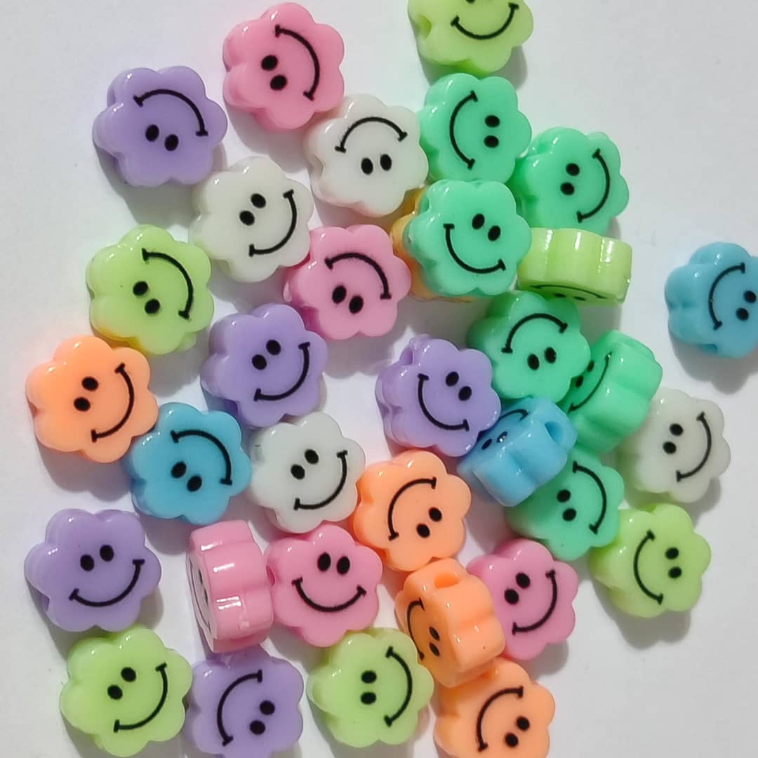 PAQUETE FLORES DE COLORES CON CARITA FELIZ (8 UND)