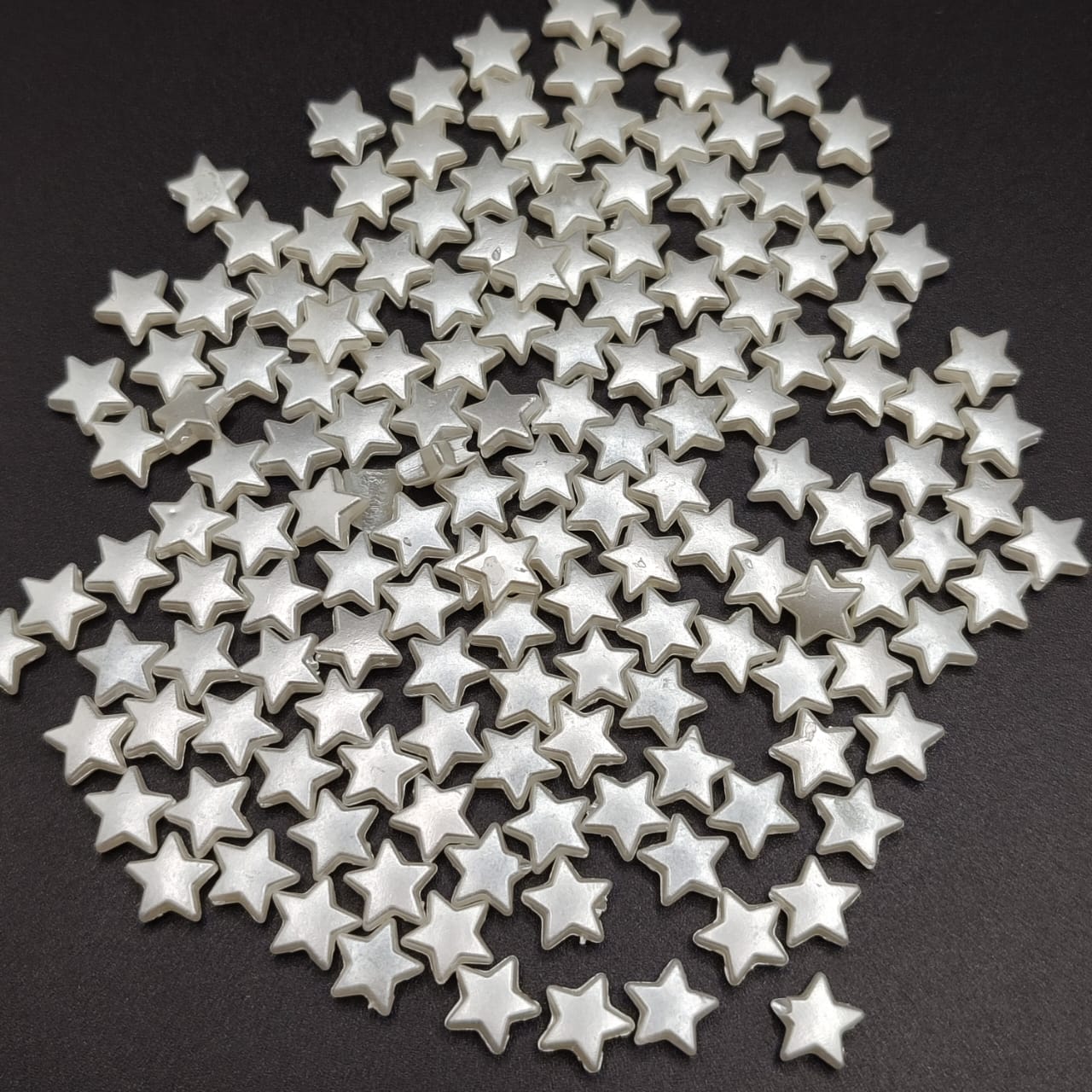 PAQUETE ESTRELLAS PERLADAS 8MM (100 UND )