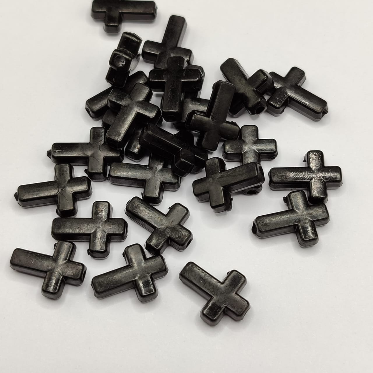 PAQUETE CRUCES NEGRA 15MM (20 UND)