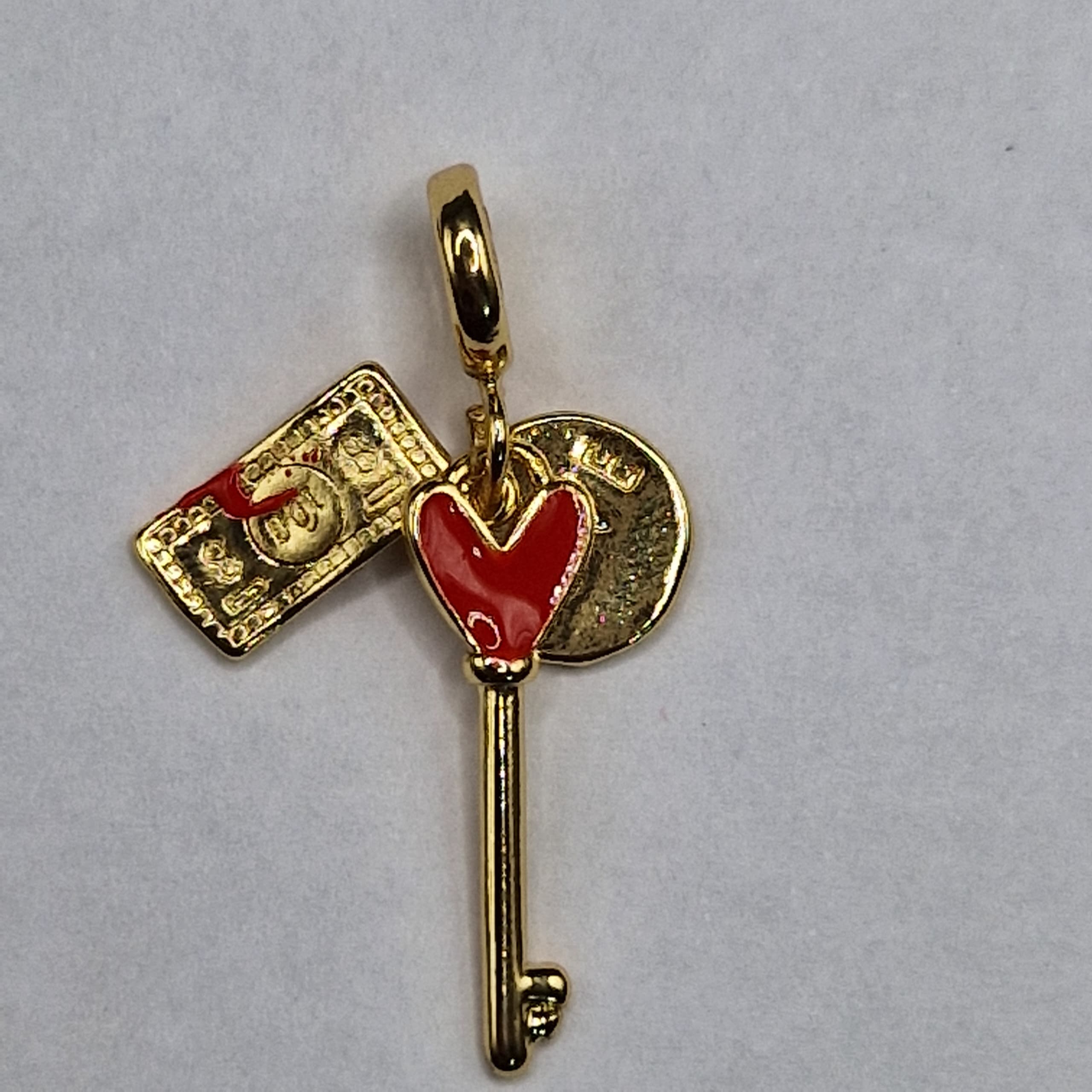 DIJE PANDORA LLAVE CORAZON Y 100 DOLARES