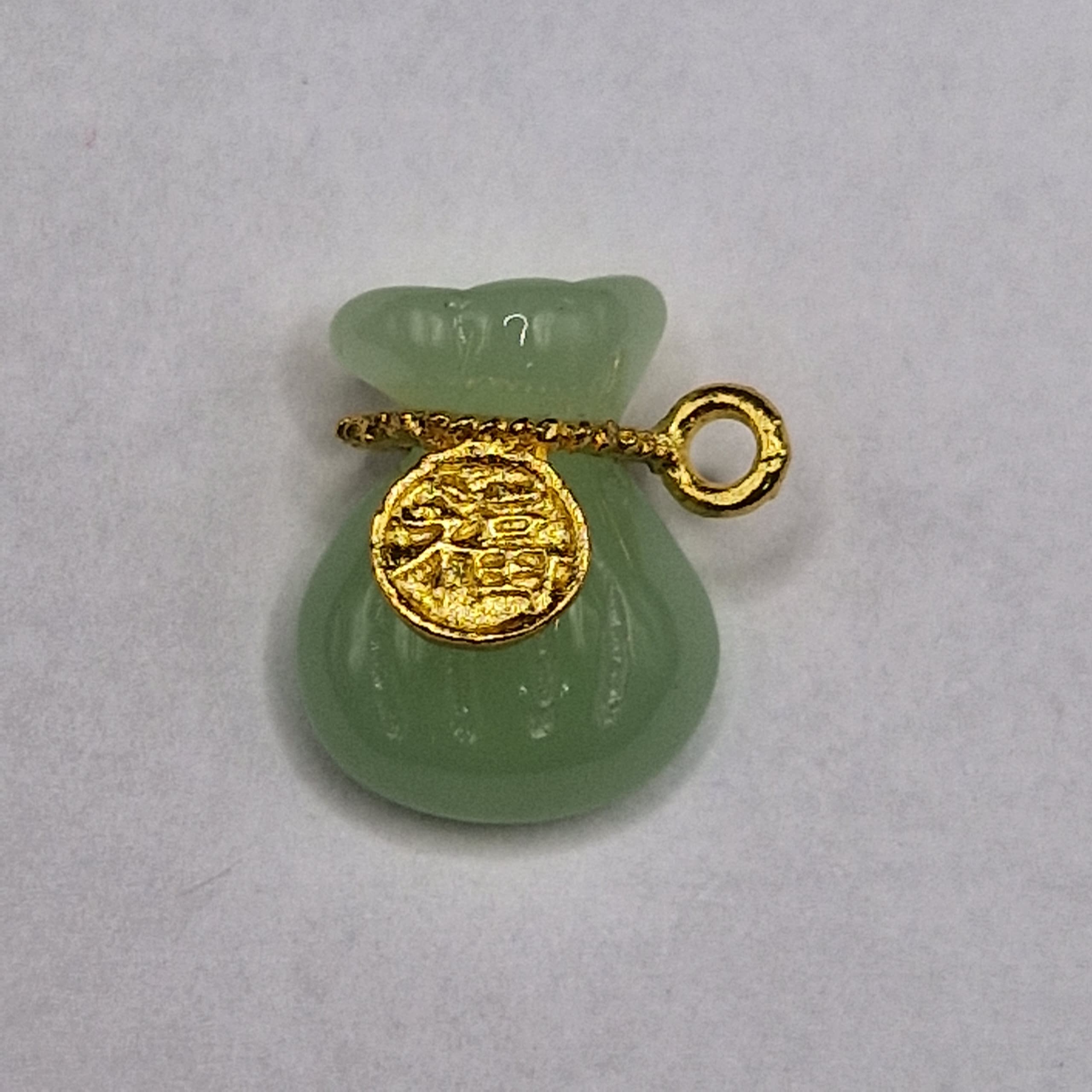 DIJE DE ORO CHINO BOLSA VERDE CLARO