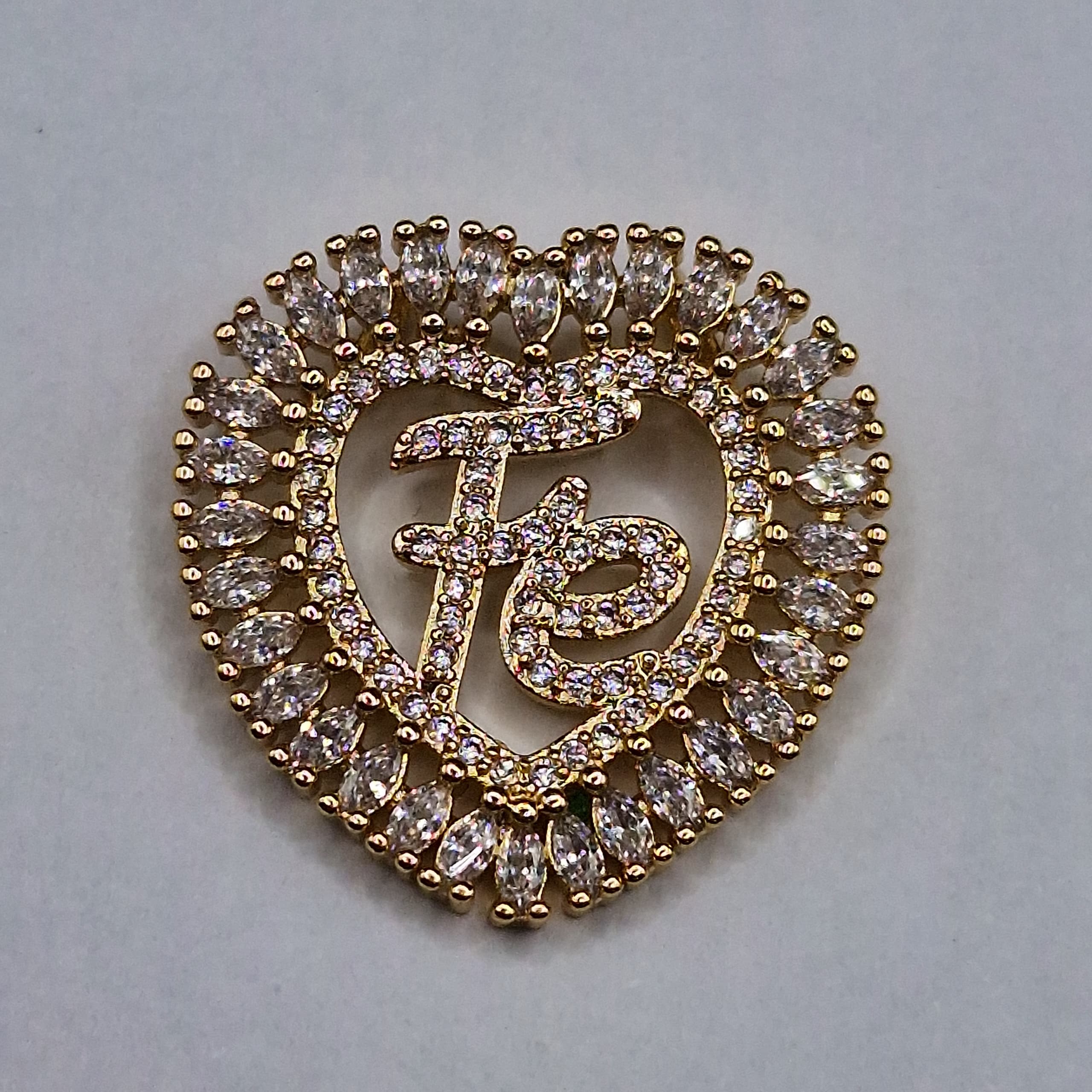 DIJE DE CIRCON DOBLE CORAZON CON FE