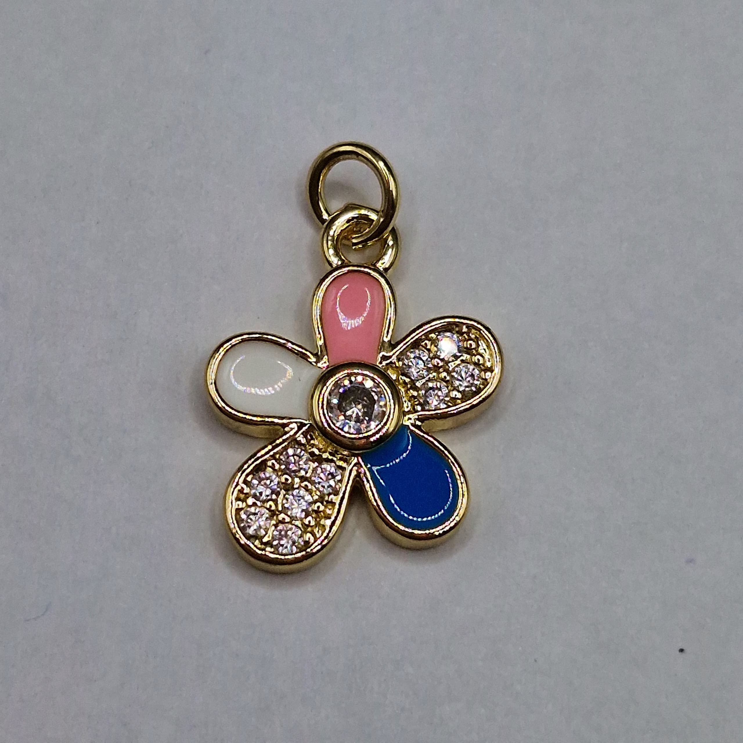 DIJE DE CIRCON FLOR ROSADA Y AZUL