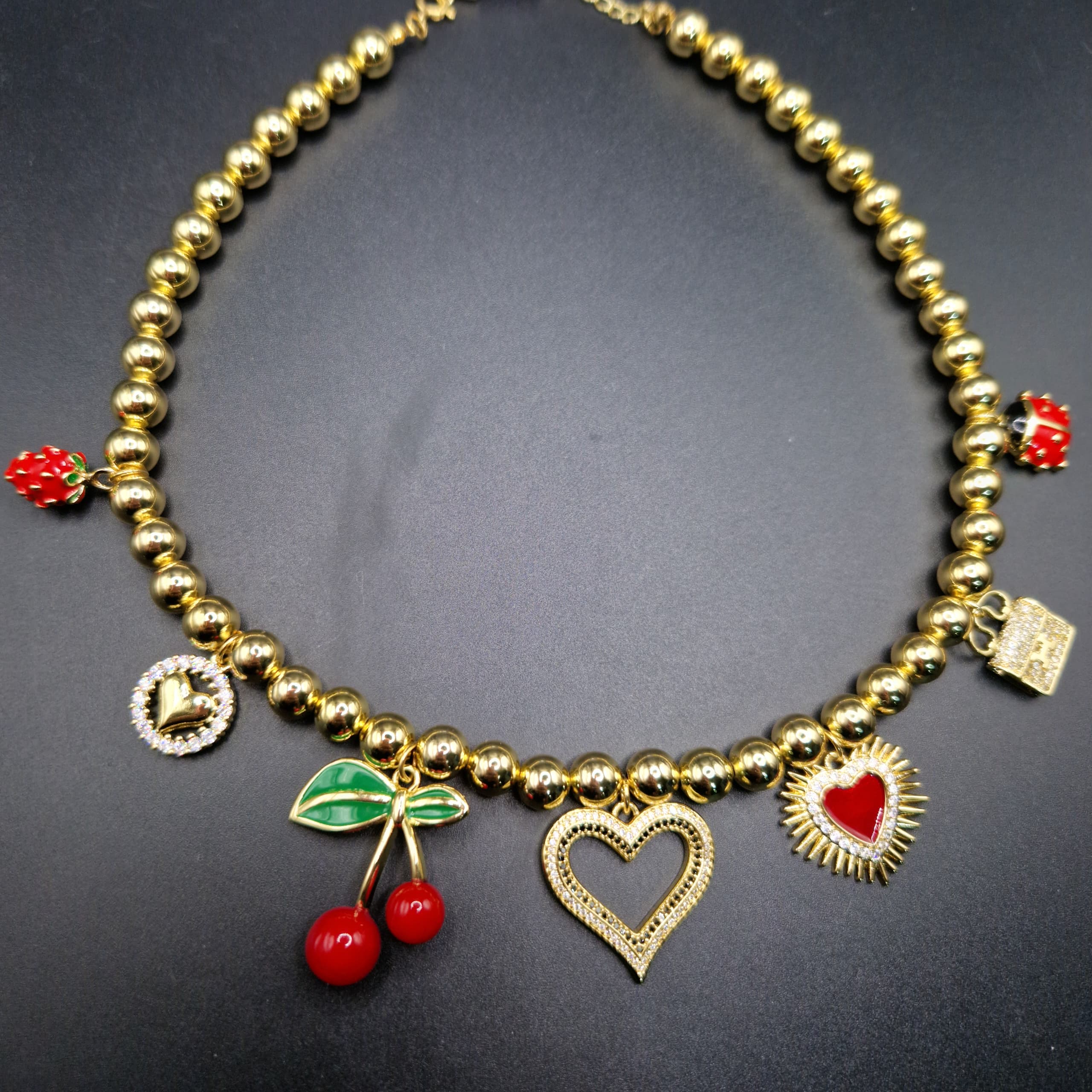 COLLAR FRESA/CORAZON/CEREZA/CORAZON/CORAZON/CARTERA/COQUITO