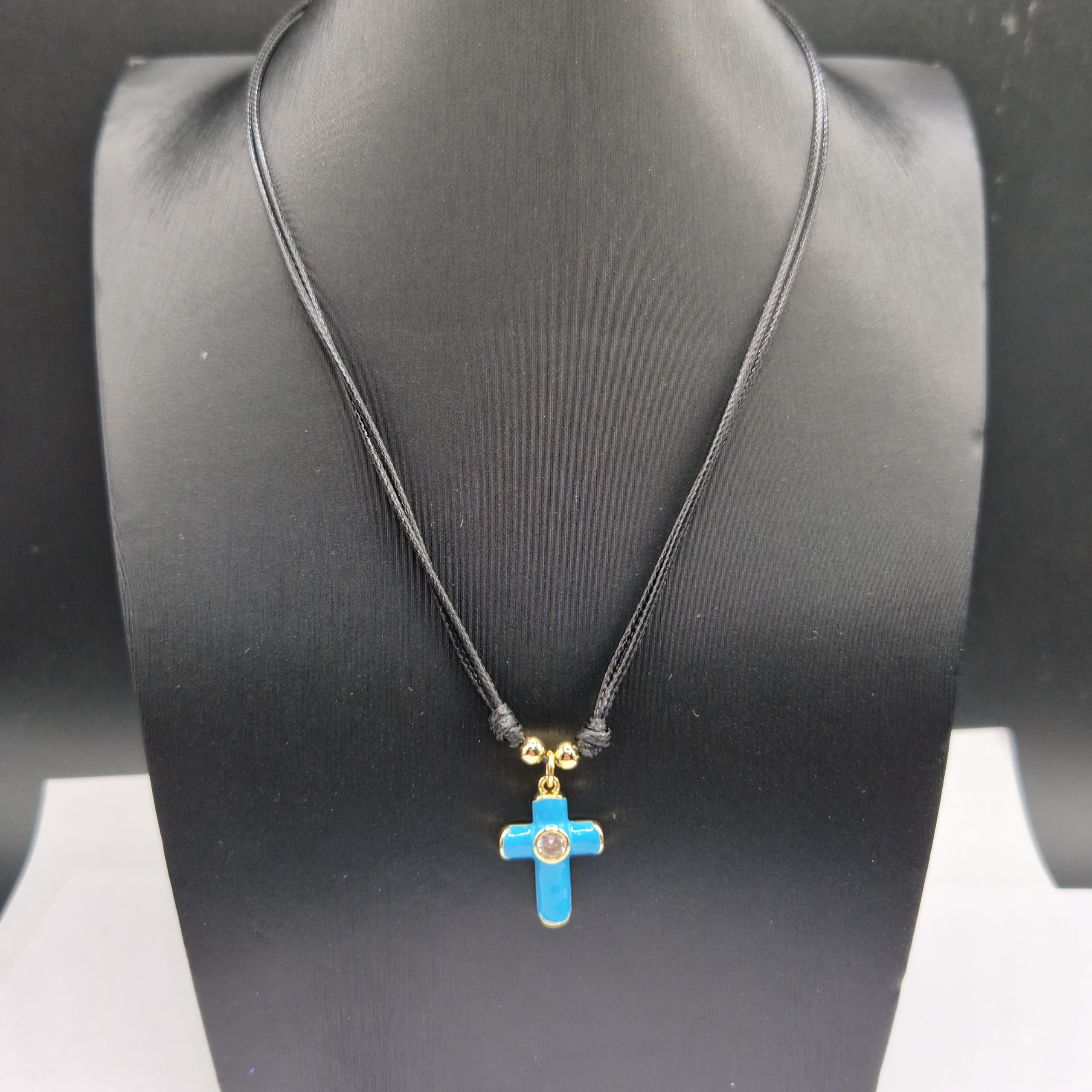 COLLAR PIEL DE SERPIENTE CON CRUZ