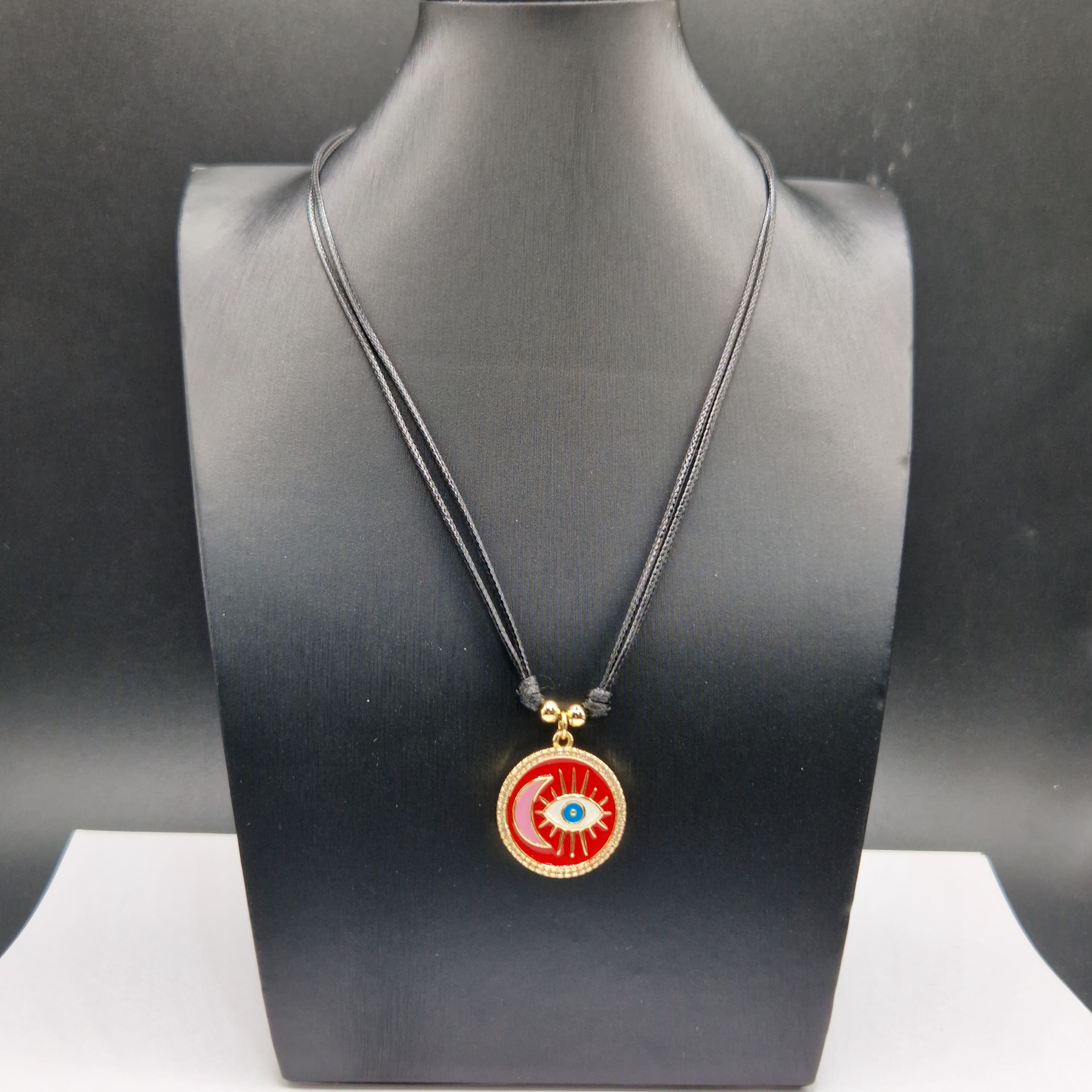 COLLAR DE PIEL DE SERPIENTE CON DIJE DE OJO CON LUNA