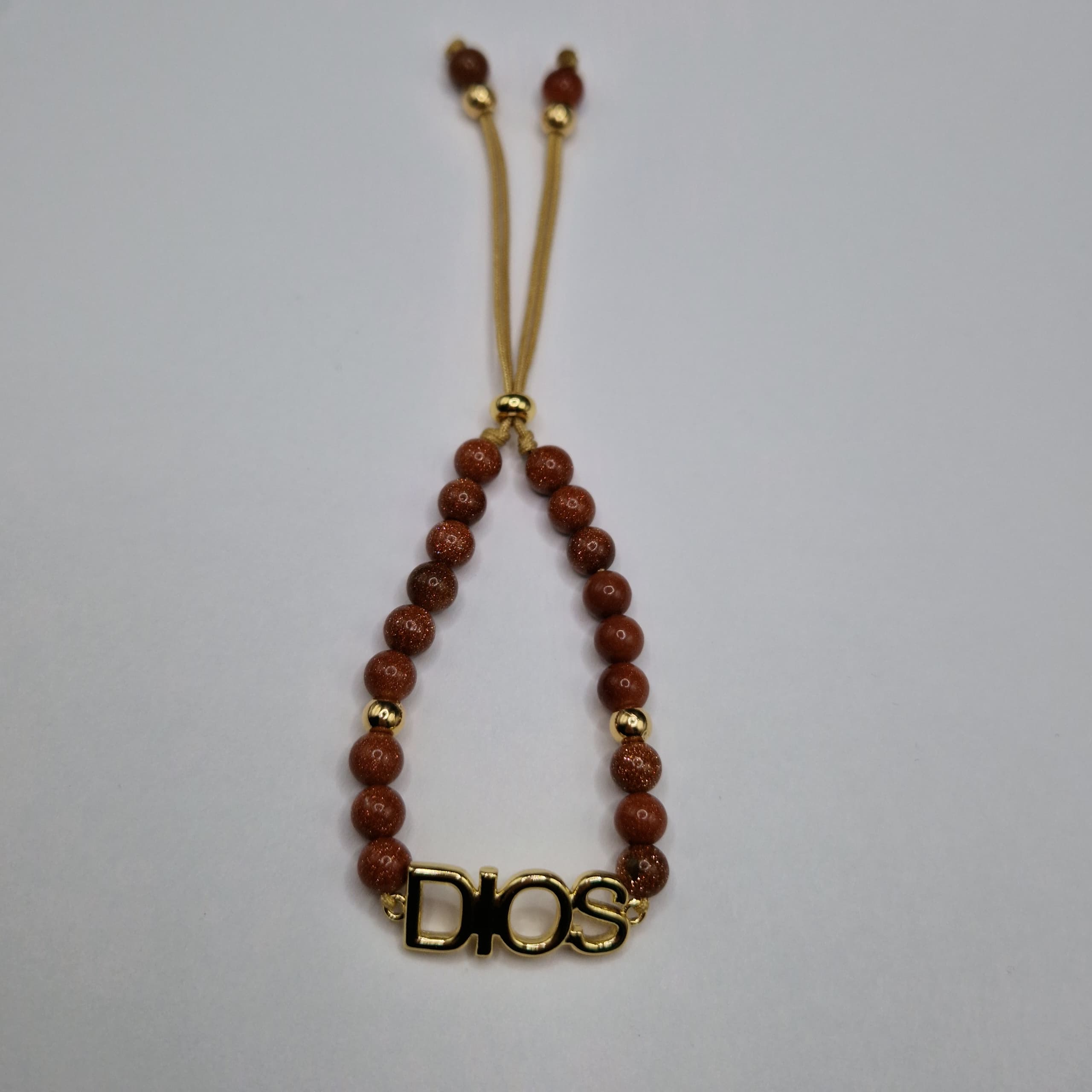 PULSERA DE LLUVIA DE ORO CON DIJE DE DIOS