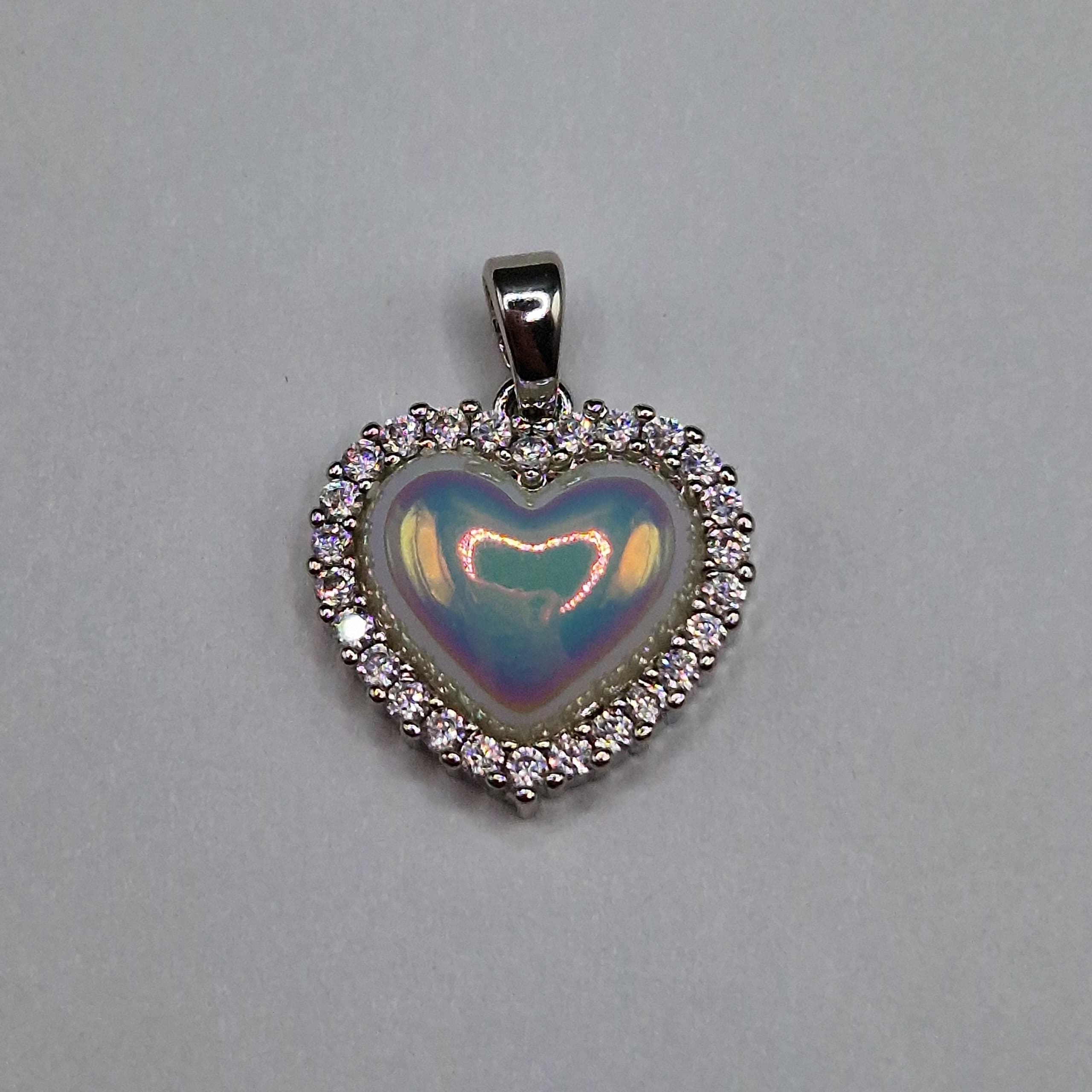 CIRCON DIJE CORAZON PLATEADO DE PERLA