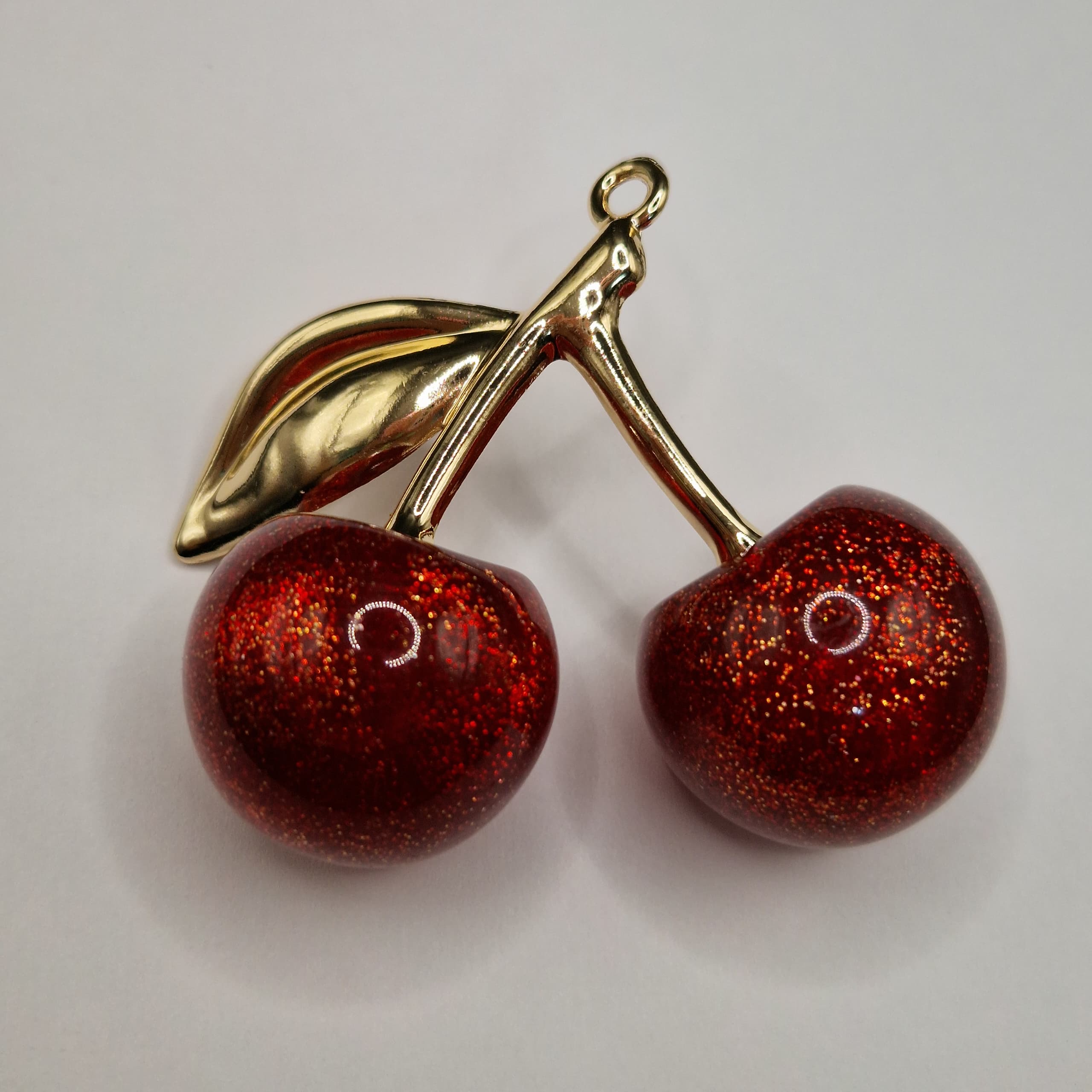 ORO CHINO LLAVERO CEREZA VINOTINTO