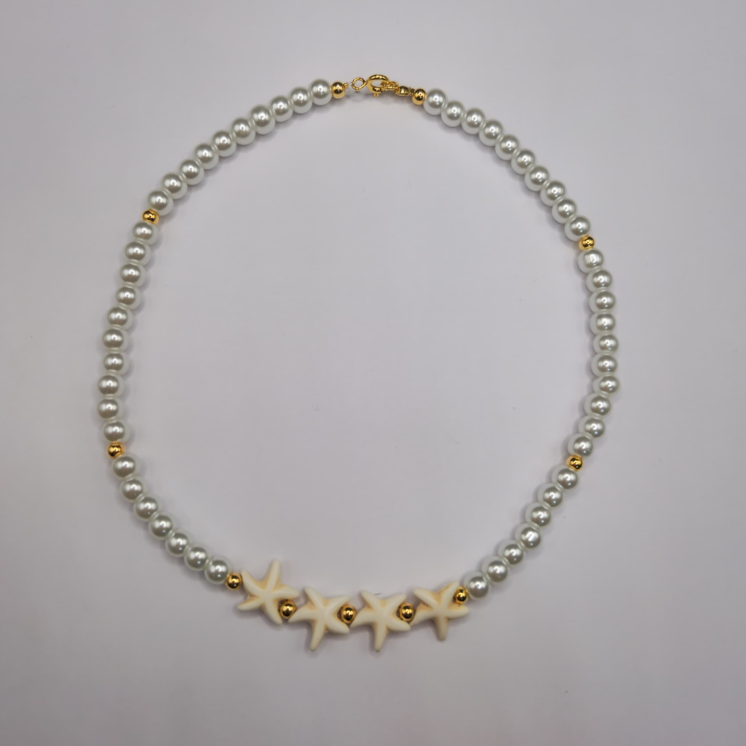 COLLARES DE PERLA CON ESTRELLA DE MAR