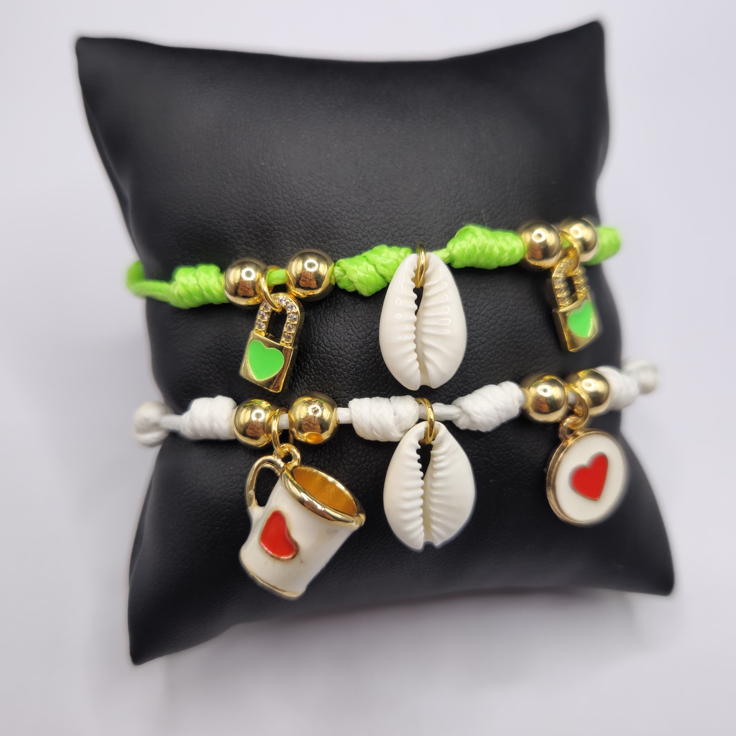PULSERAS DE PIEL DE SERPIENTE CON DIJES