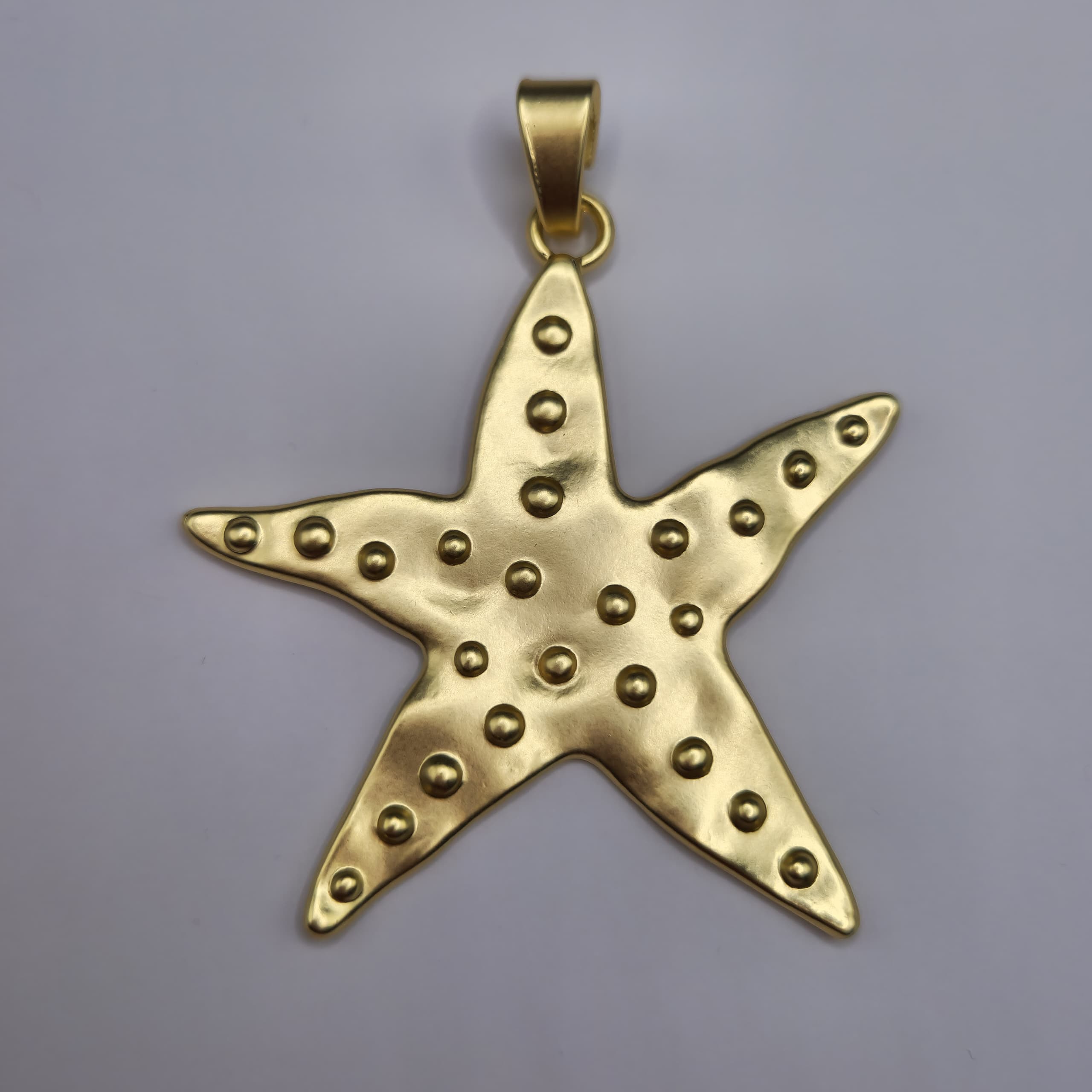 DIJE ORO CHINO ESTRELLA DE MAR GRANDE