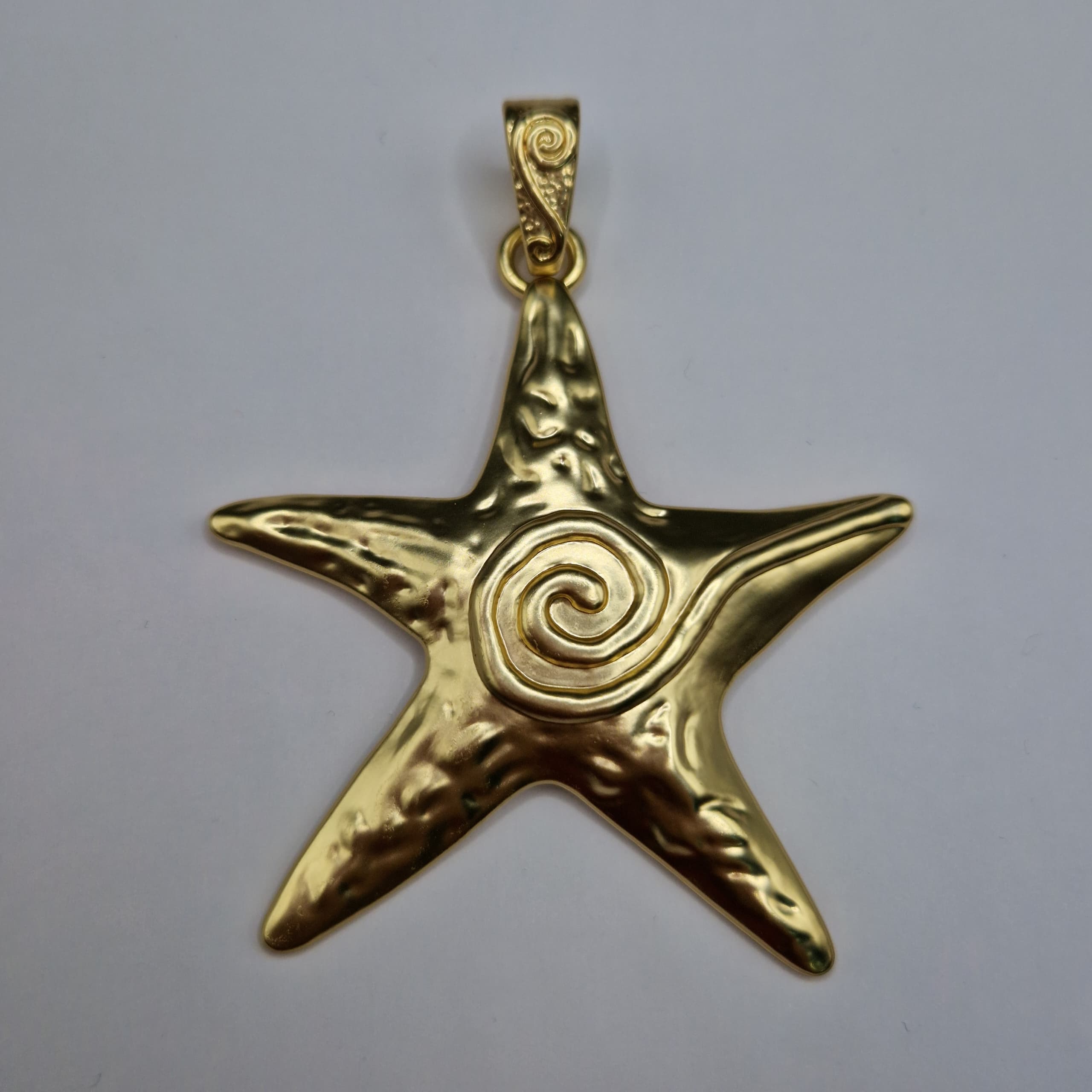 DIJE ORO CHINO ESTRELLA GRANDE