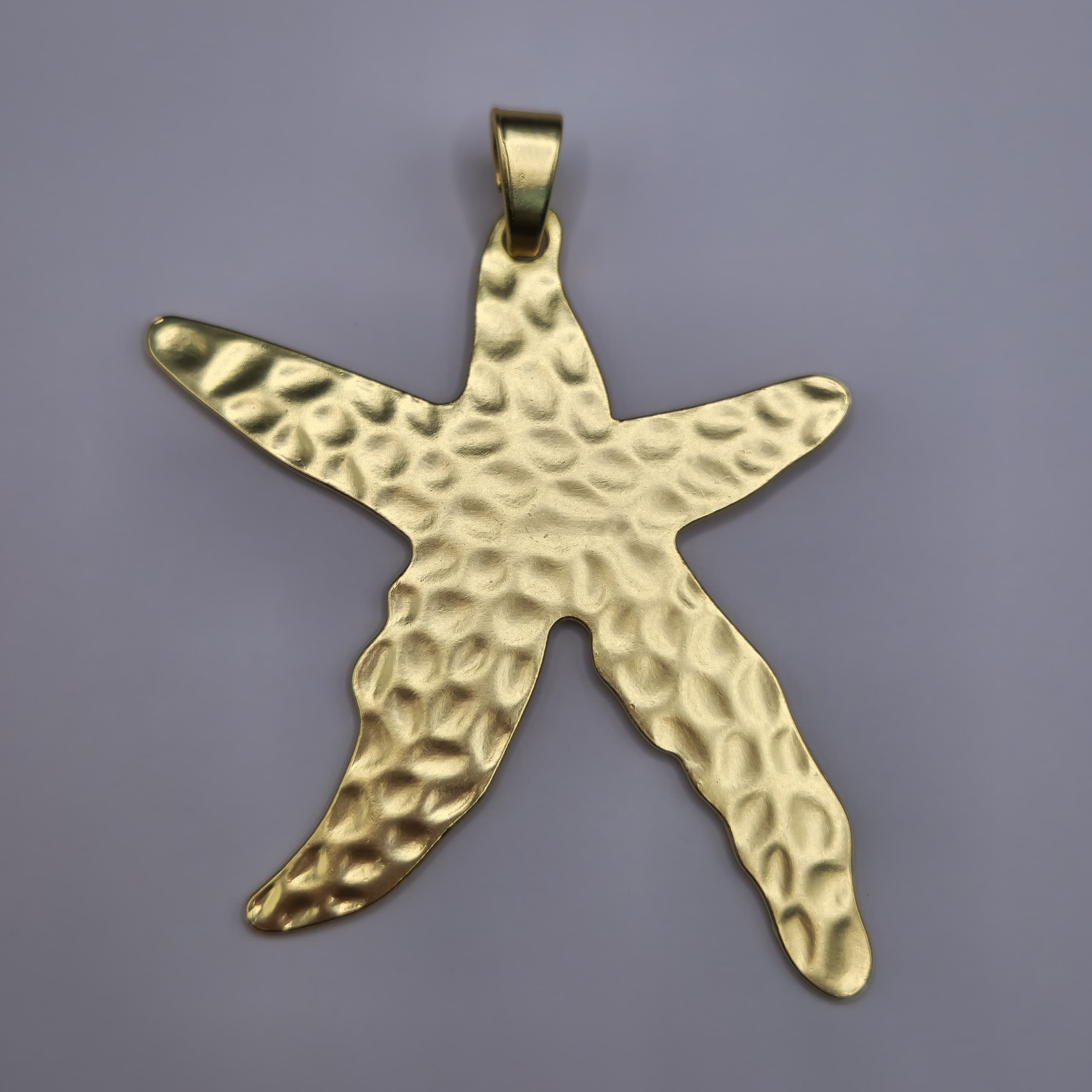 DIJE ORO CHINO ESTRELLA DE MAR GRANDE