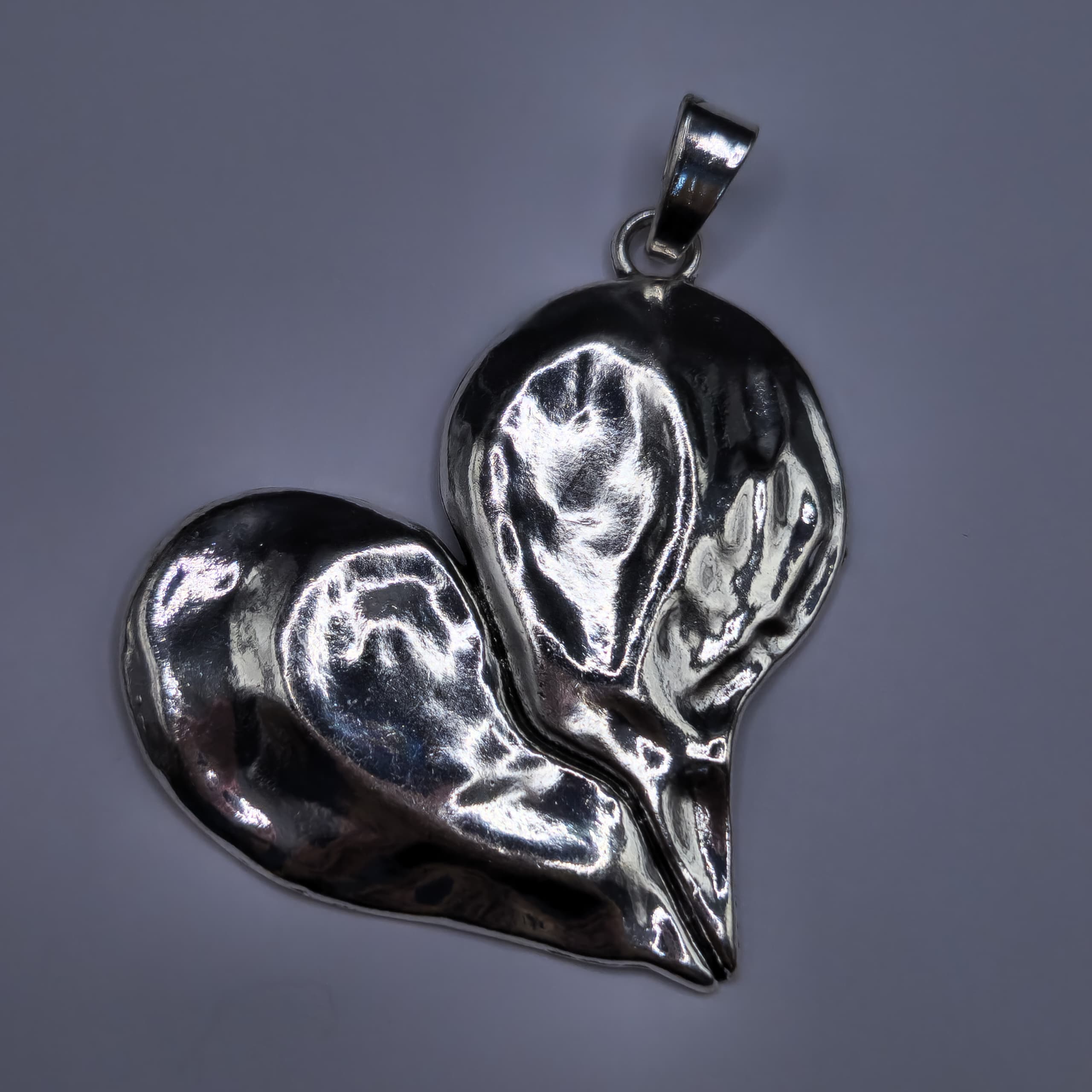 SILVER DIJE DE CORAZON ROTO GRANDE