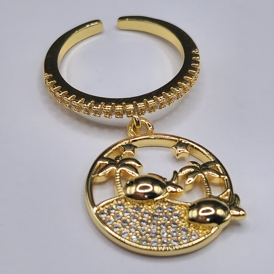 ANILLO CON DIJE DE PLAYA CON PEZ