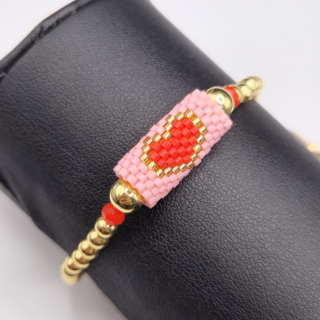 PULSERA DE BALINES CON CORAZON ROSA Y ROJO