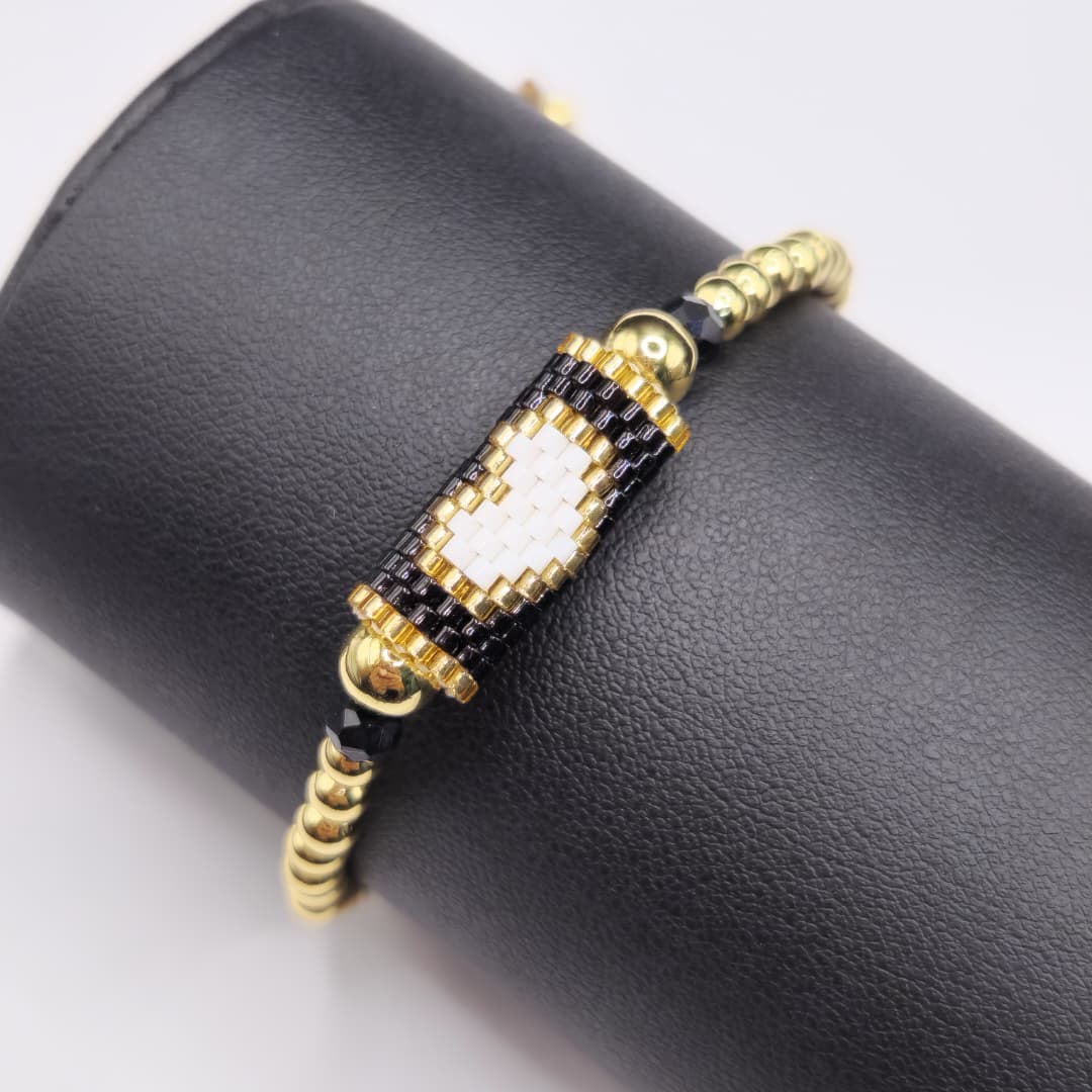 PULSERA DE BALINES CON CORAZON NEGRO Y BLANCO