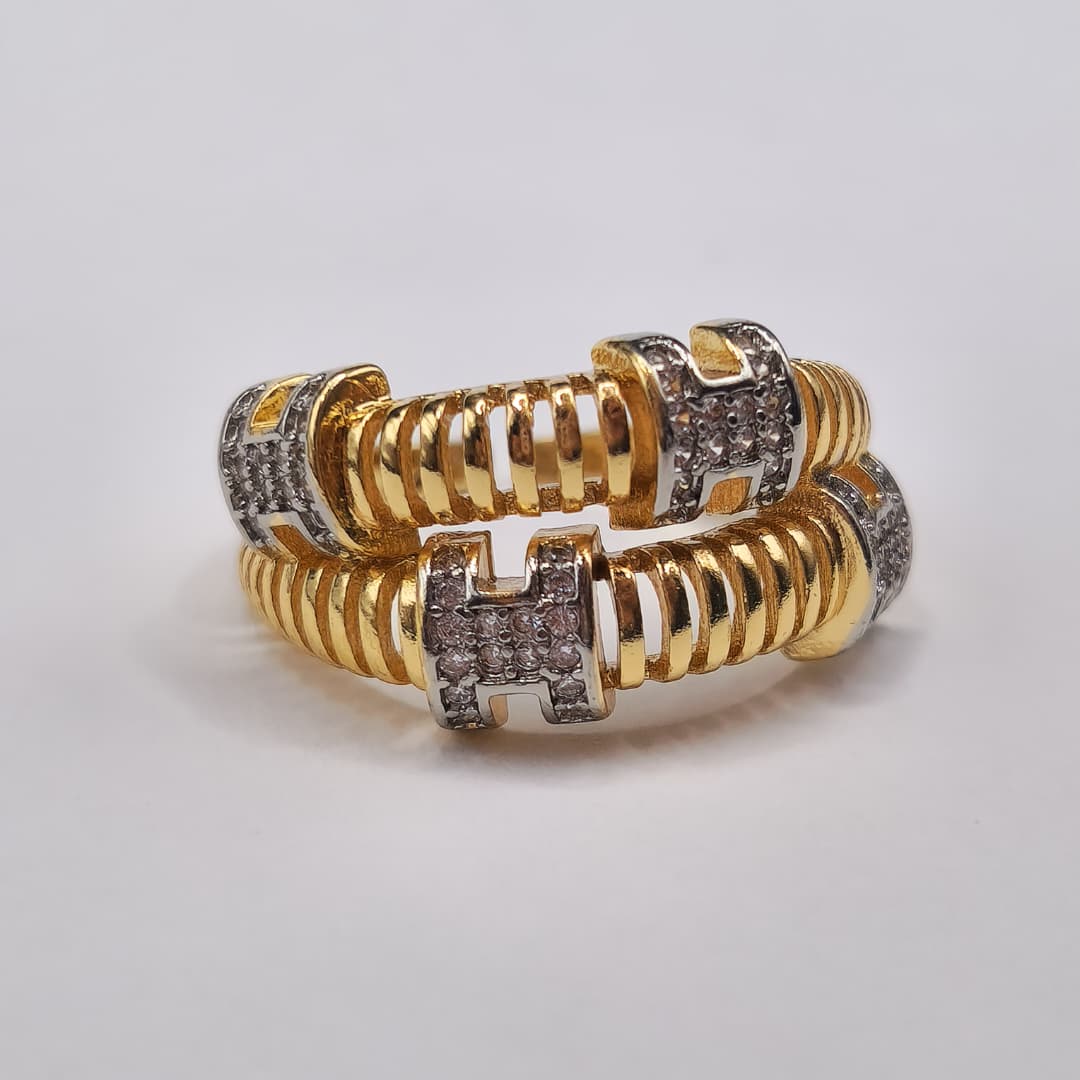 ANILLO DOBLE CON CUATRO H PLATEADA