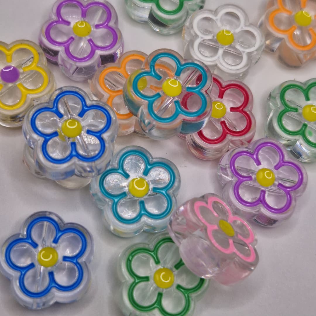 BOLSA 4 UND FLORES TRANSPARENTES DE COLORES