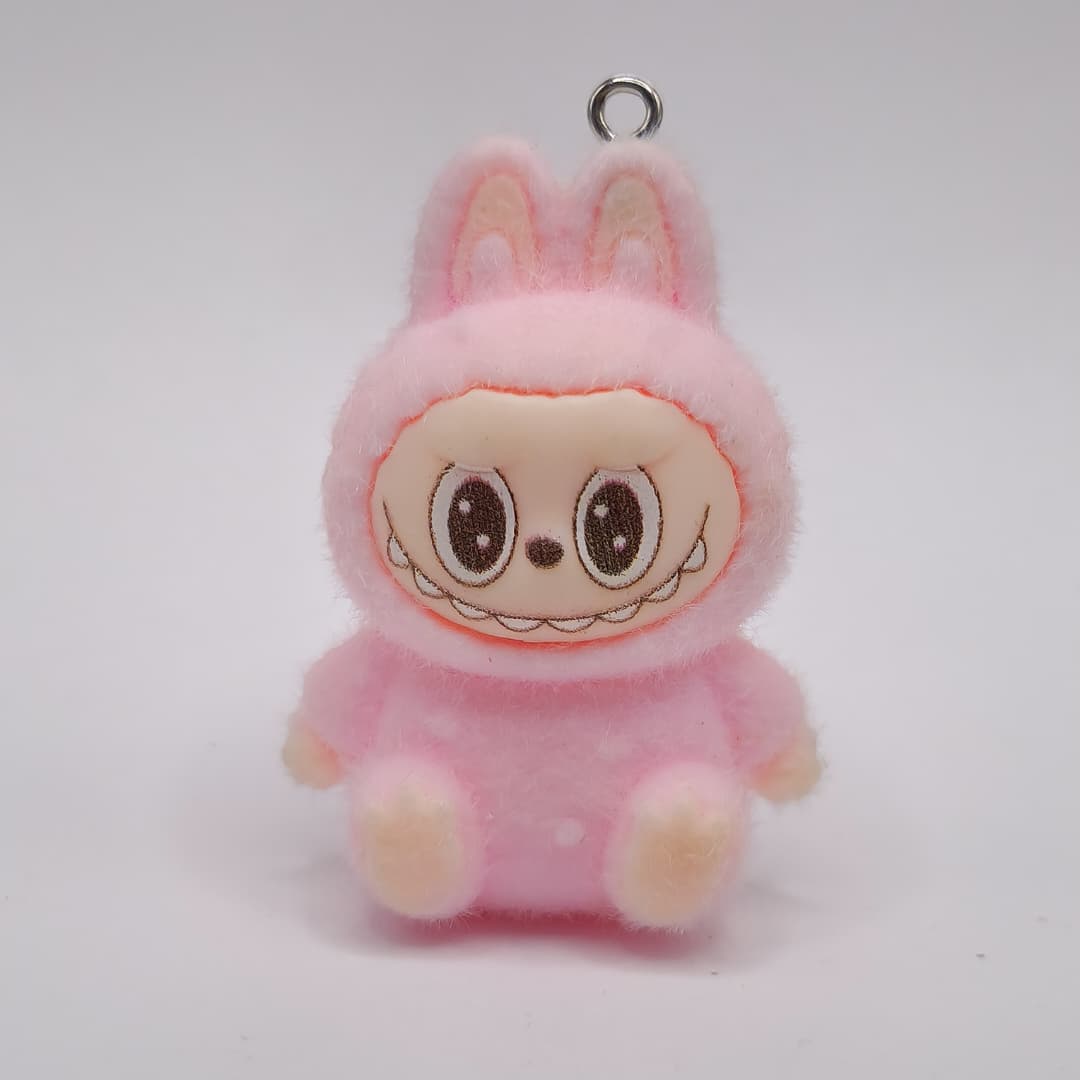 LABUBU ROSADO SENTADO
