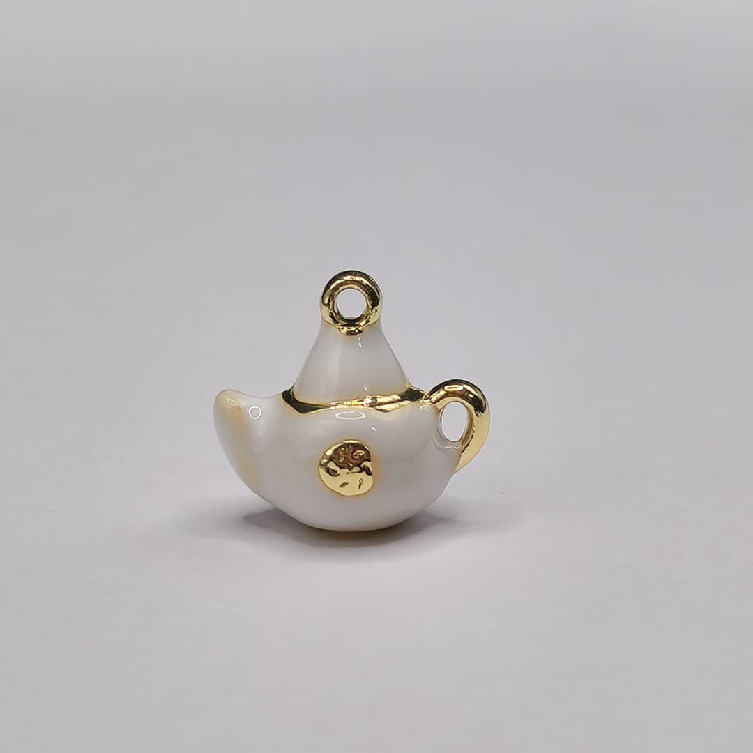 ORO CHINO DIJE DE TETERA BLANCA
