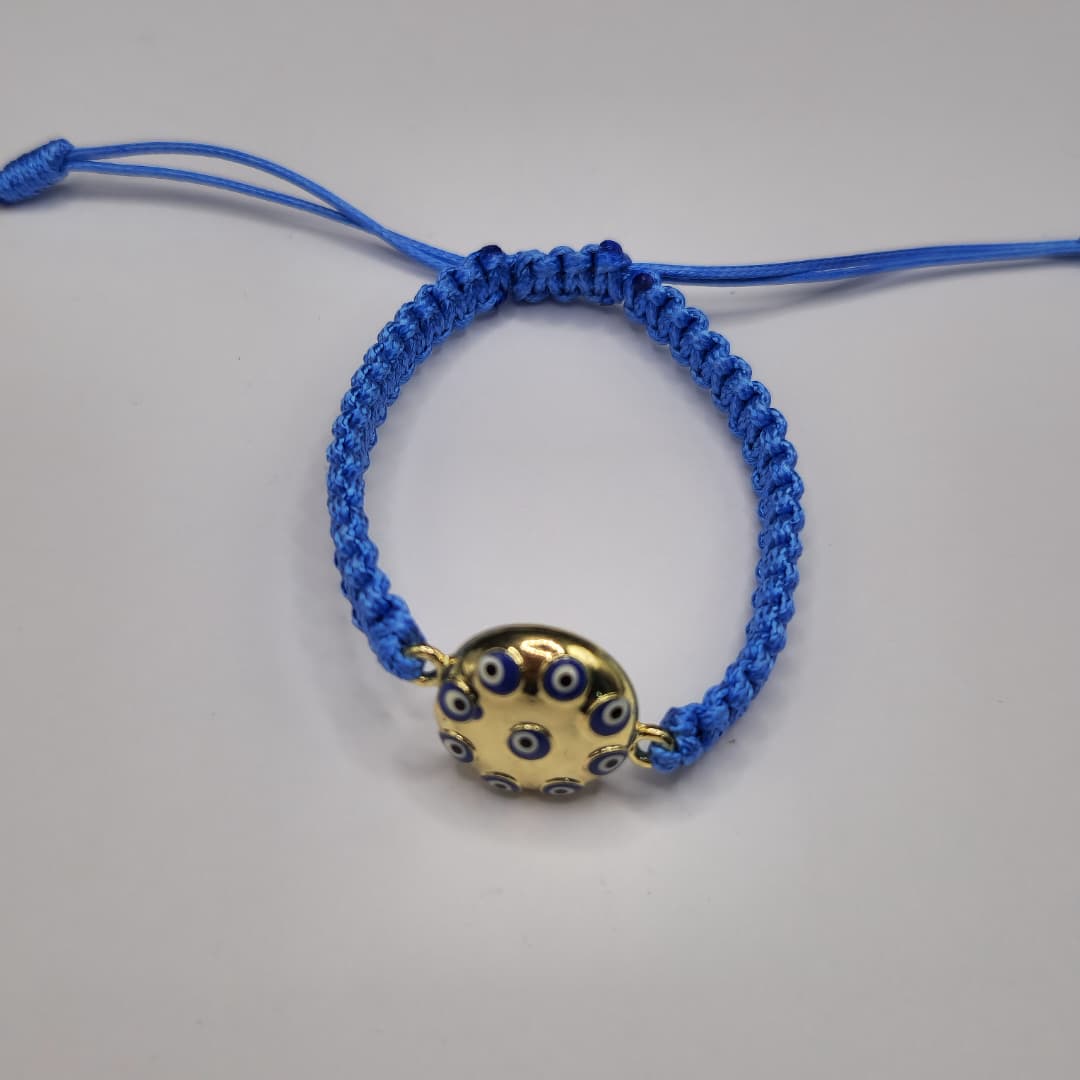 PULSERA DE HILO AZUL CON DIJES DE OJOS TURCOS