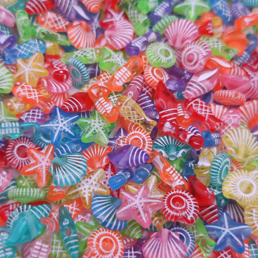 BOLSA 40 UND FIGURAS MARINAS DE COLORES TRANSLUCIDAS