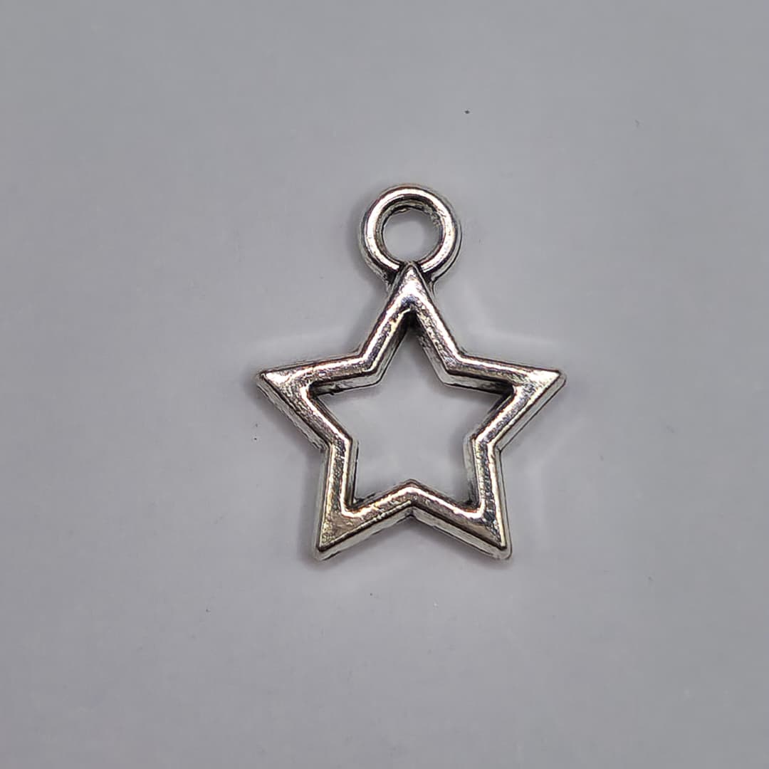 SILVER DIJE DE ESTRELLA HUECA 12X14MM
