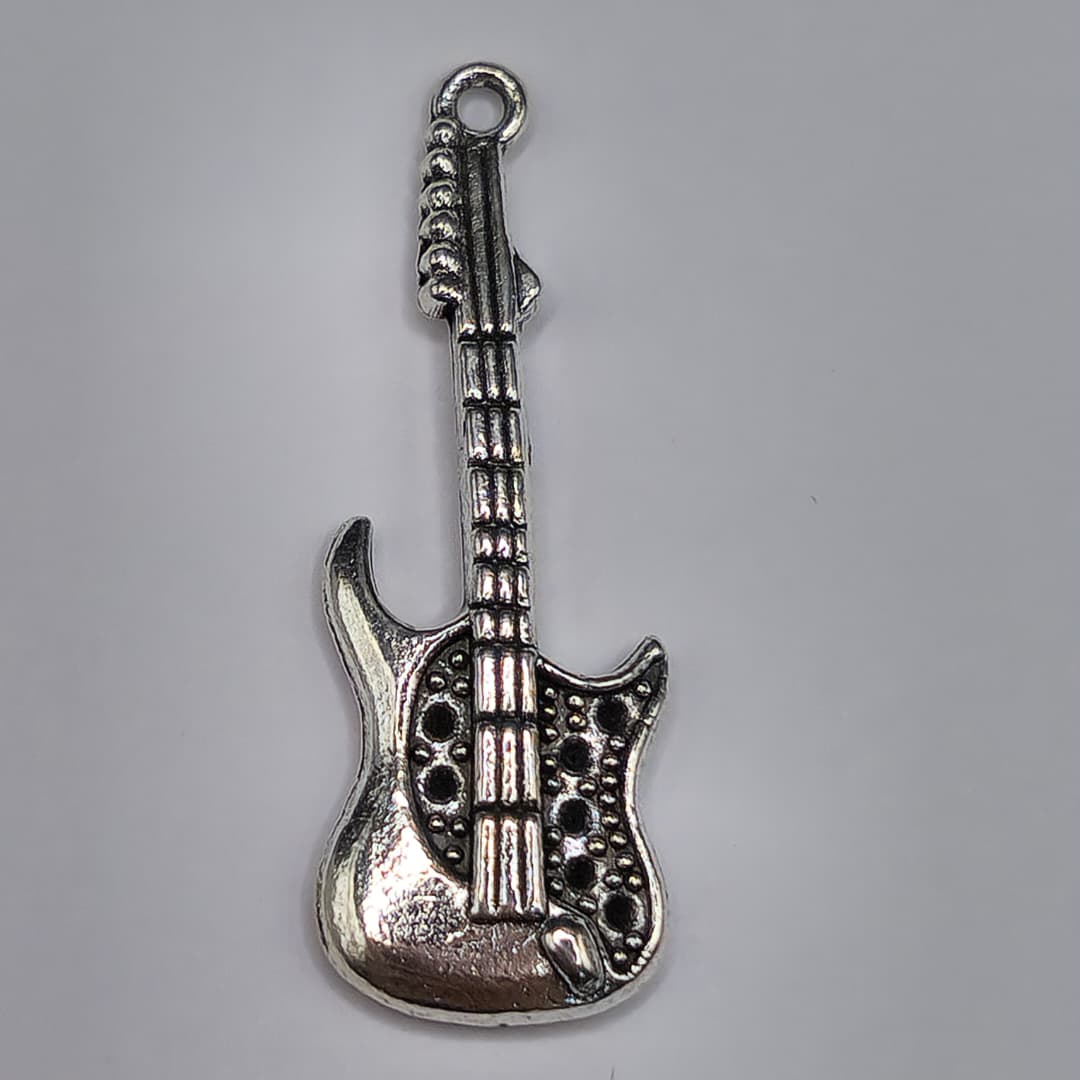 SILVER DIJE DE GUITARRA 12X38MM