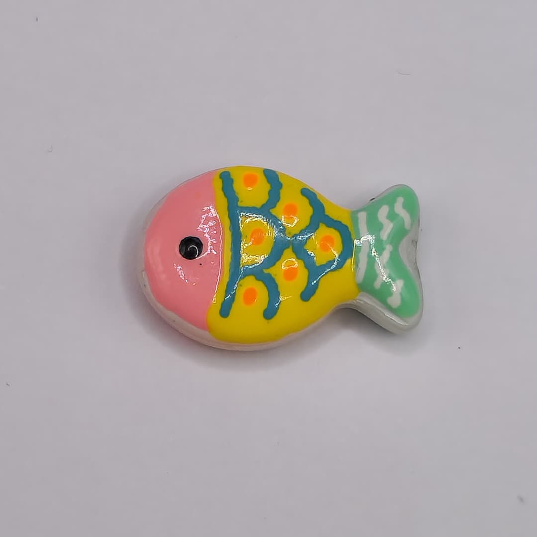 MURANO PASADOR PEZ ROSADO/AMARILLO/TURQUESA CON LINEAS VERDES
