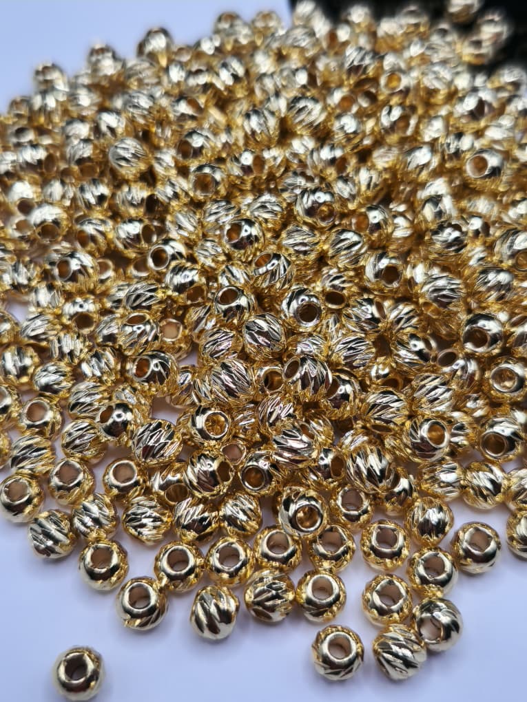 ORO LAMINADO BALINES 6MM ( 12 UND )