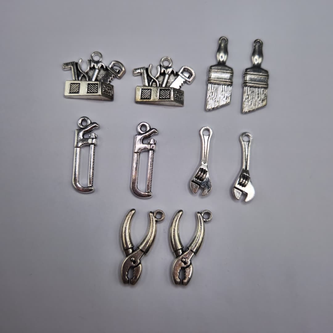 BOLSA SILVER DE 10 UND MANOS QUE CONSTRUYENDO FUERZA Y VALOR