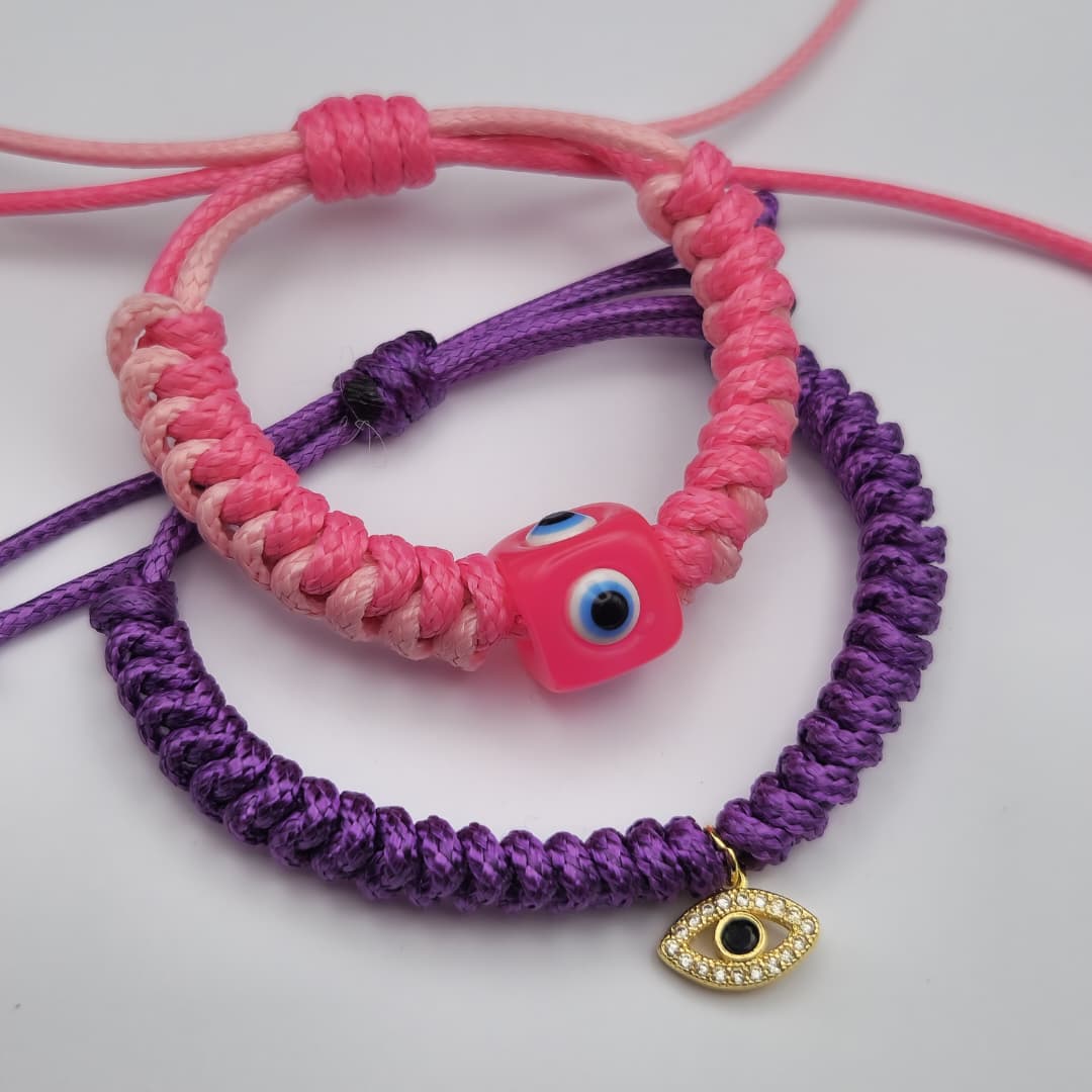 PULSERA TEJIDA PIEL DE SERPIENTE CON OJO TURCO