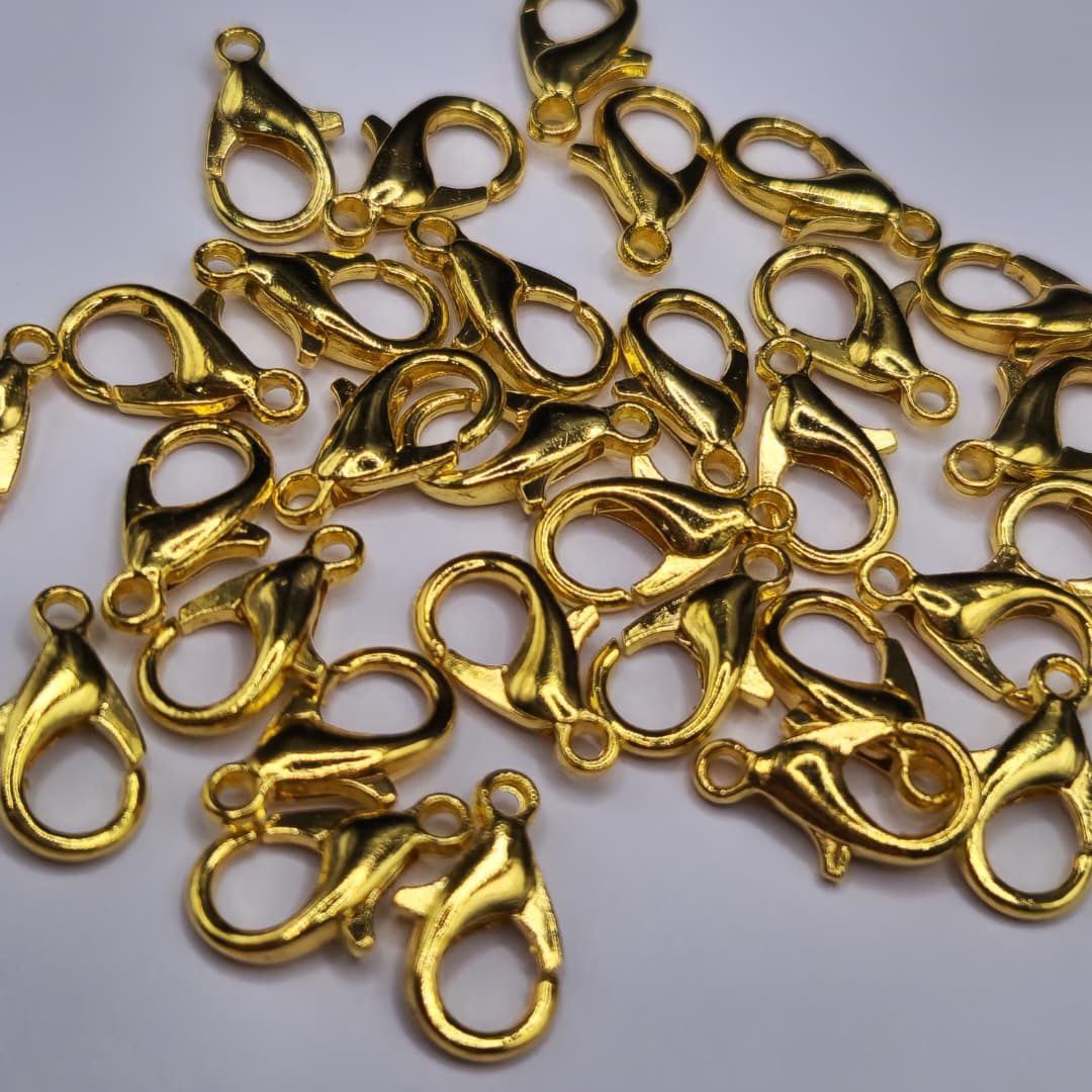 BOLSA 30 UND BROCHE PICO DE LORO 12MM DORADO FANTASIA