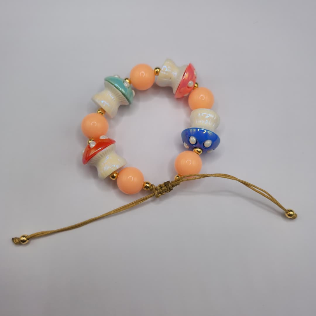 PULSERA CON ESFERAS CHICLES
