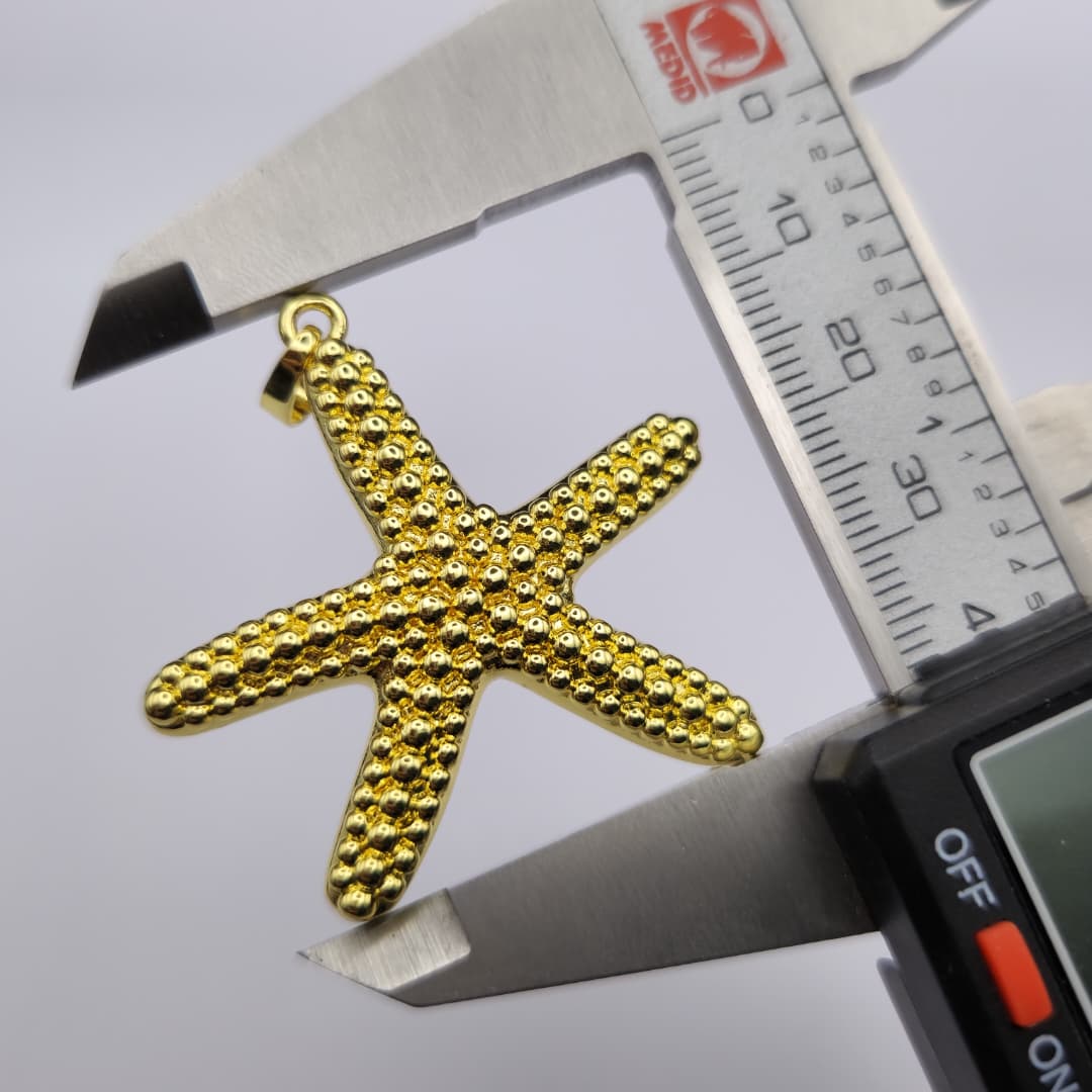 ORO CHINO DIJE ESTRELLA DE MAR GRANDE 3