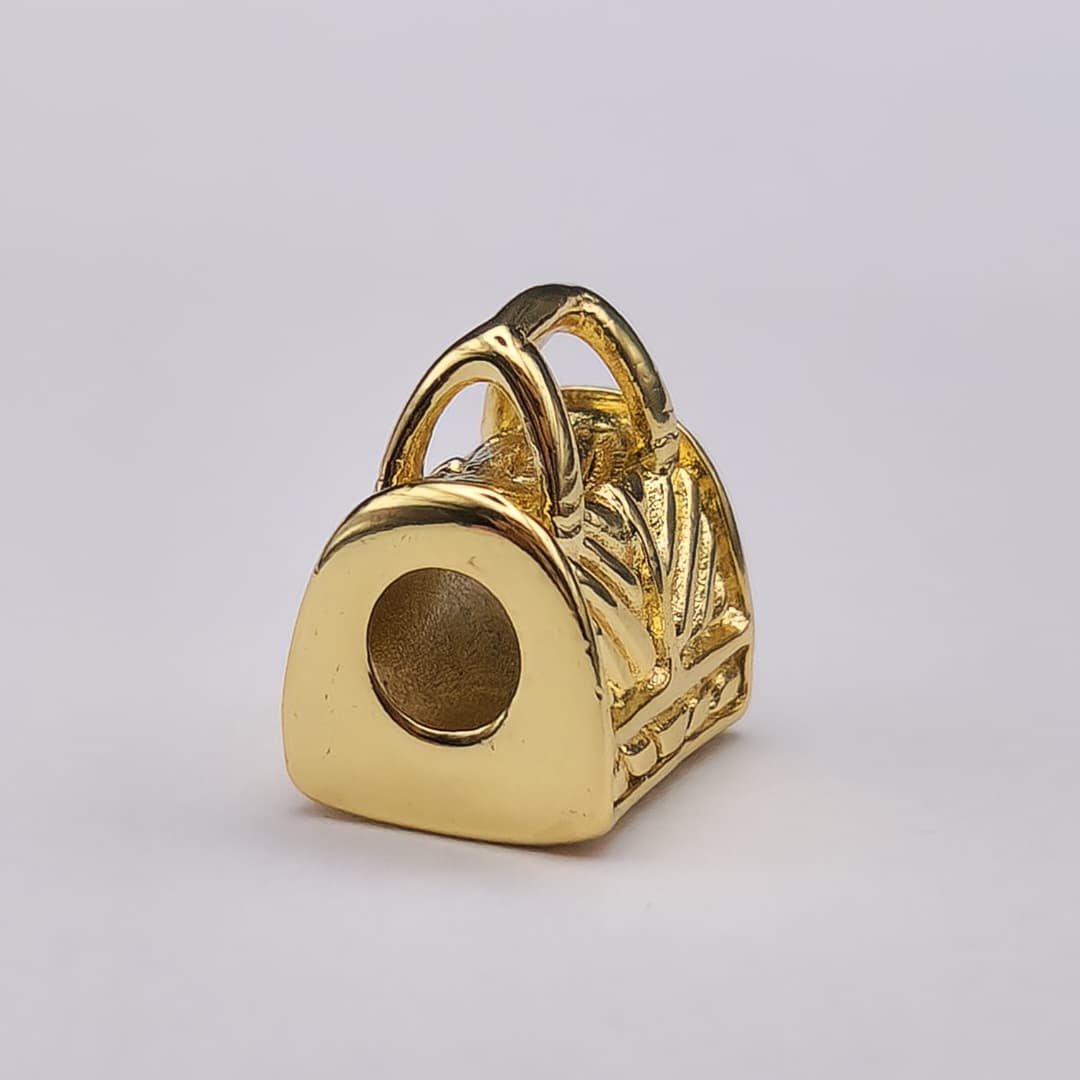 DIJE DE ORO CHINO PASADOR CARTERA 2