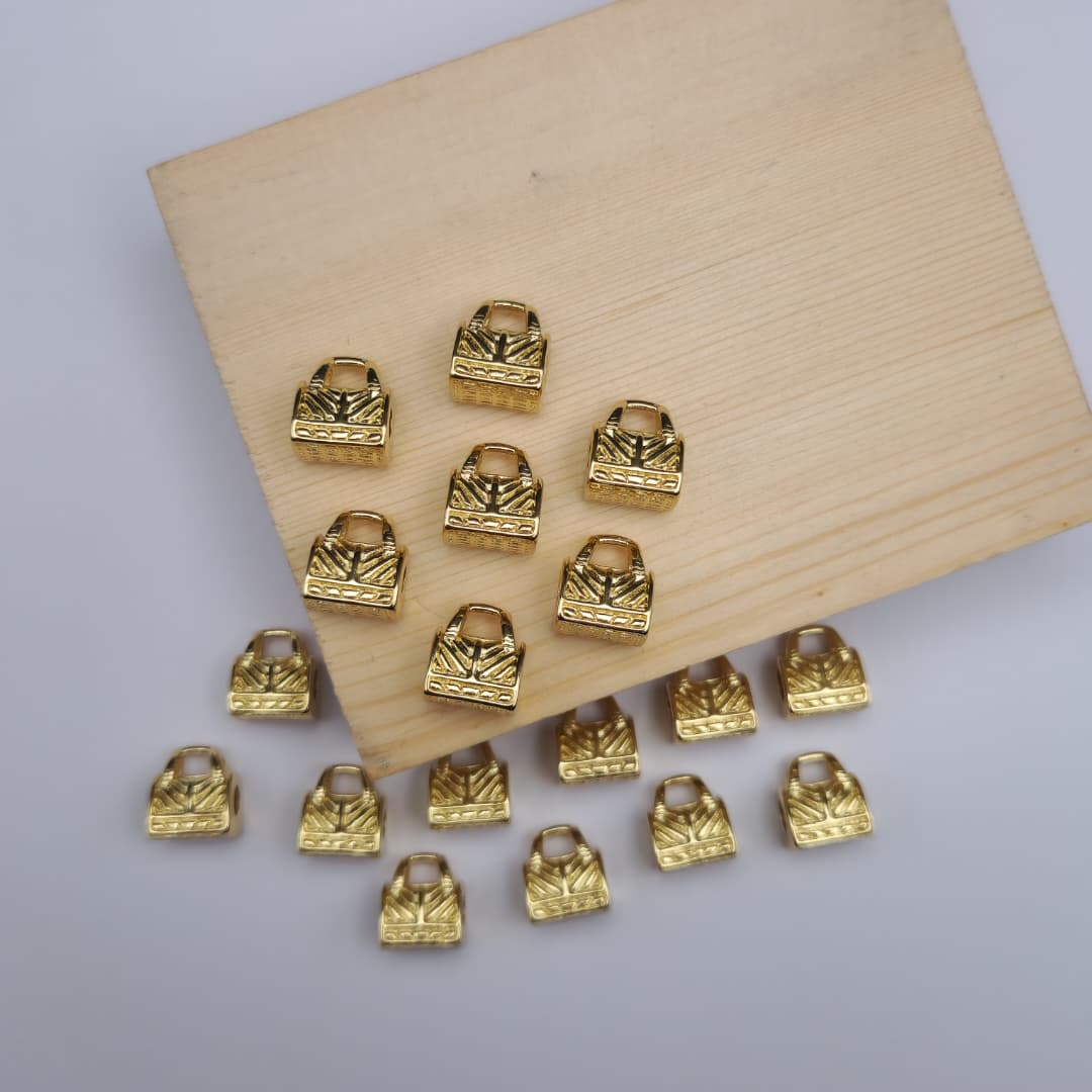 DIJE DE ORO CHINO PASADOR CARTERA 4