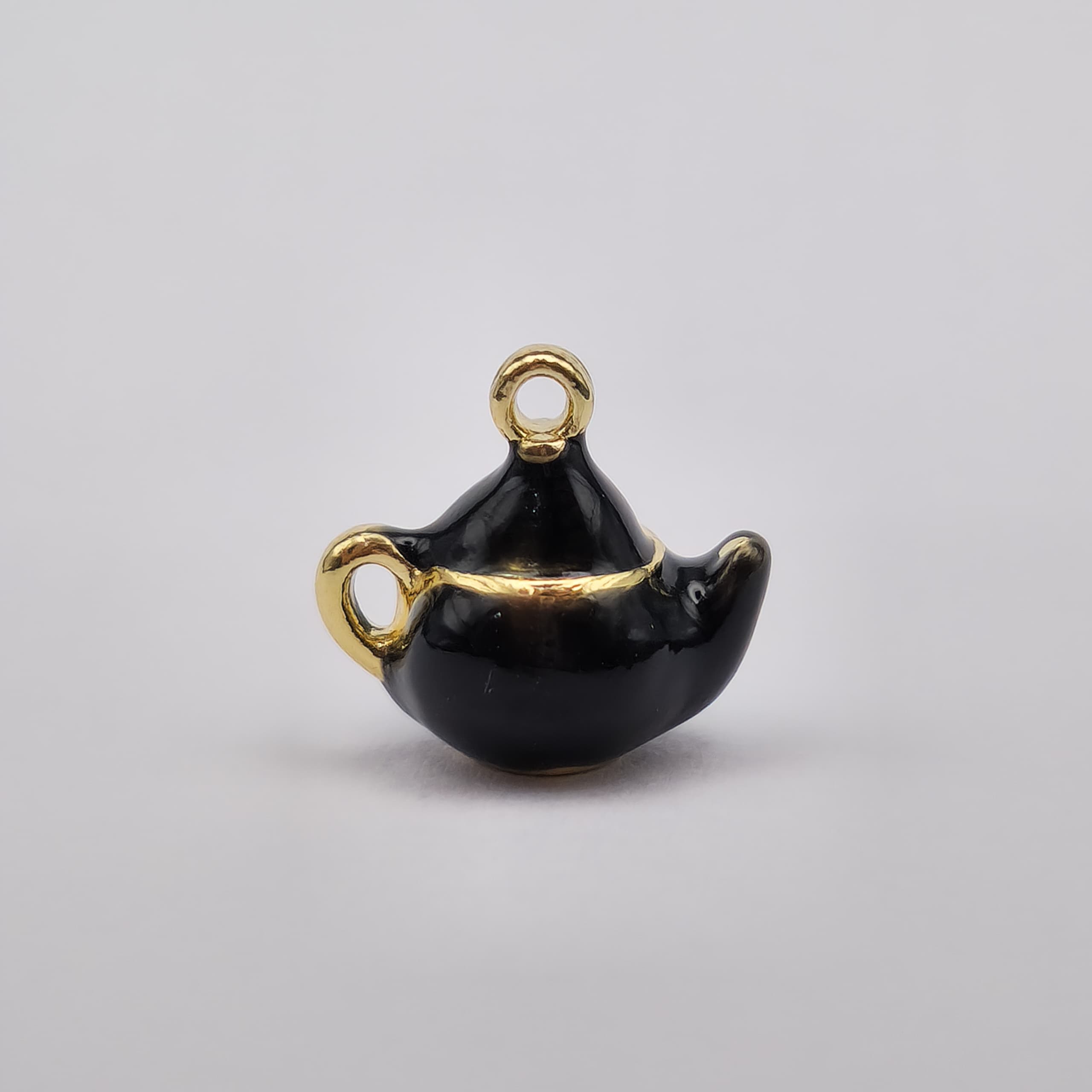 ORO CHINO DIJE DE TETERA NEGRA 2